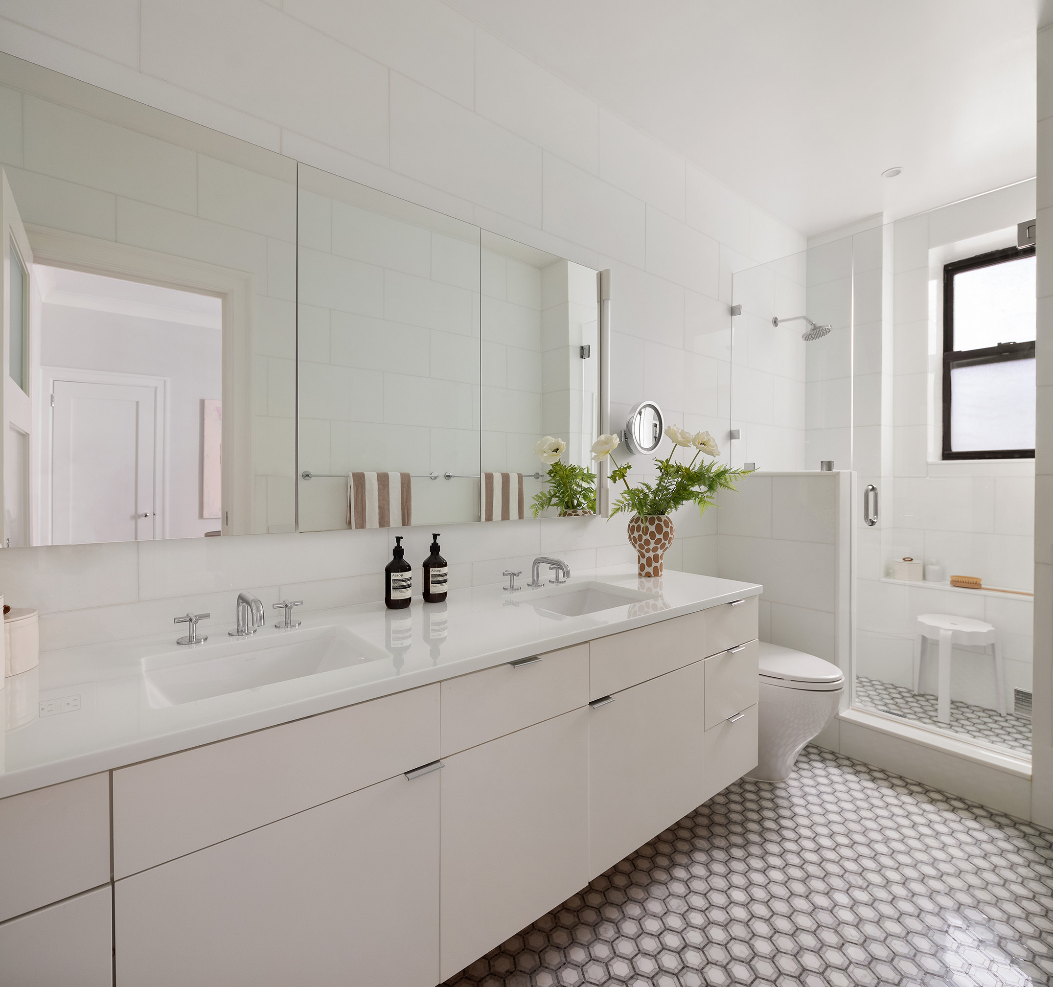 251 West 89th Street, Unit 4D Manhattan, NY 10024 - Photo 16 of 20 a bathroom with a double vanity sink mirror and toilet