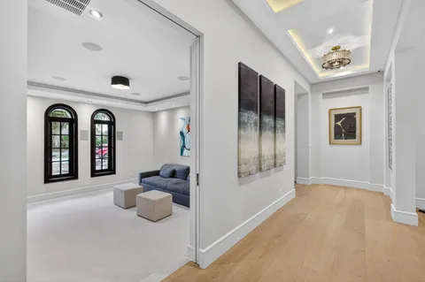 a view of a livingroom with furniture and entryway