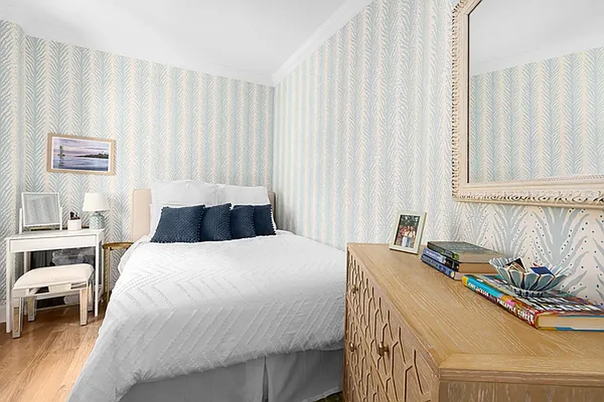 204 West 10th Street, Unit 18 Manhattan, NY 10014 - Photo 4 of 10 a bedroom with a bed and a window