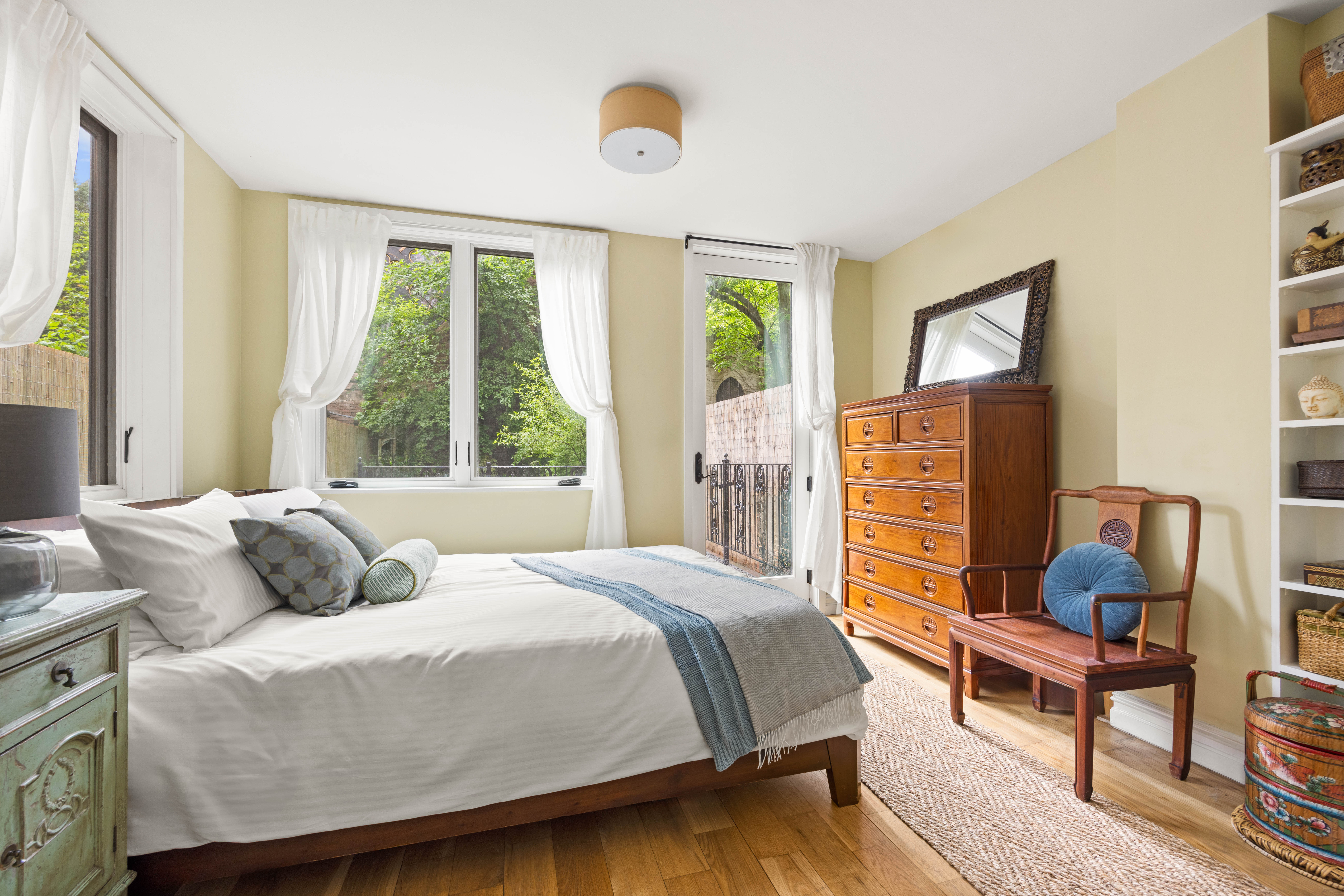 38 7th Avenue, Unit 1 Brooklyn, NY 11217 - Photo 4 of 13 a bedroom with furniture and a window