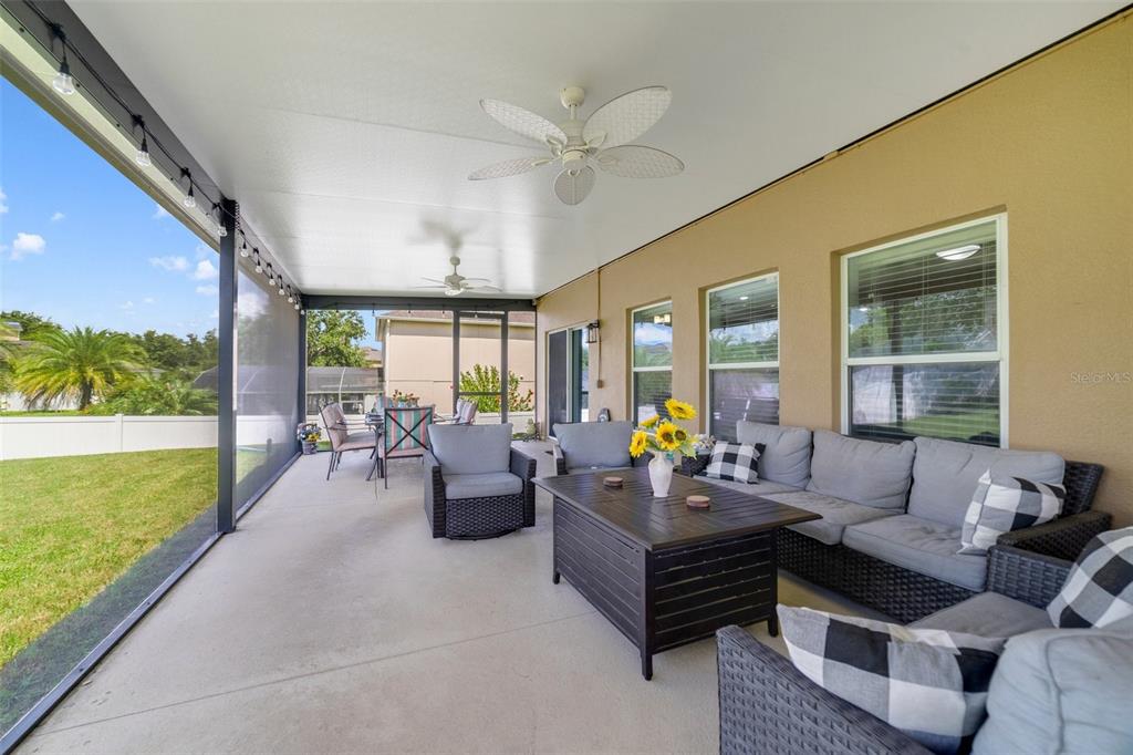 352 Giovani Boulevard Clermont, FL 34715 - Photo 34 of 46 a living room with furniture and a large window