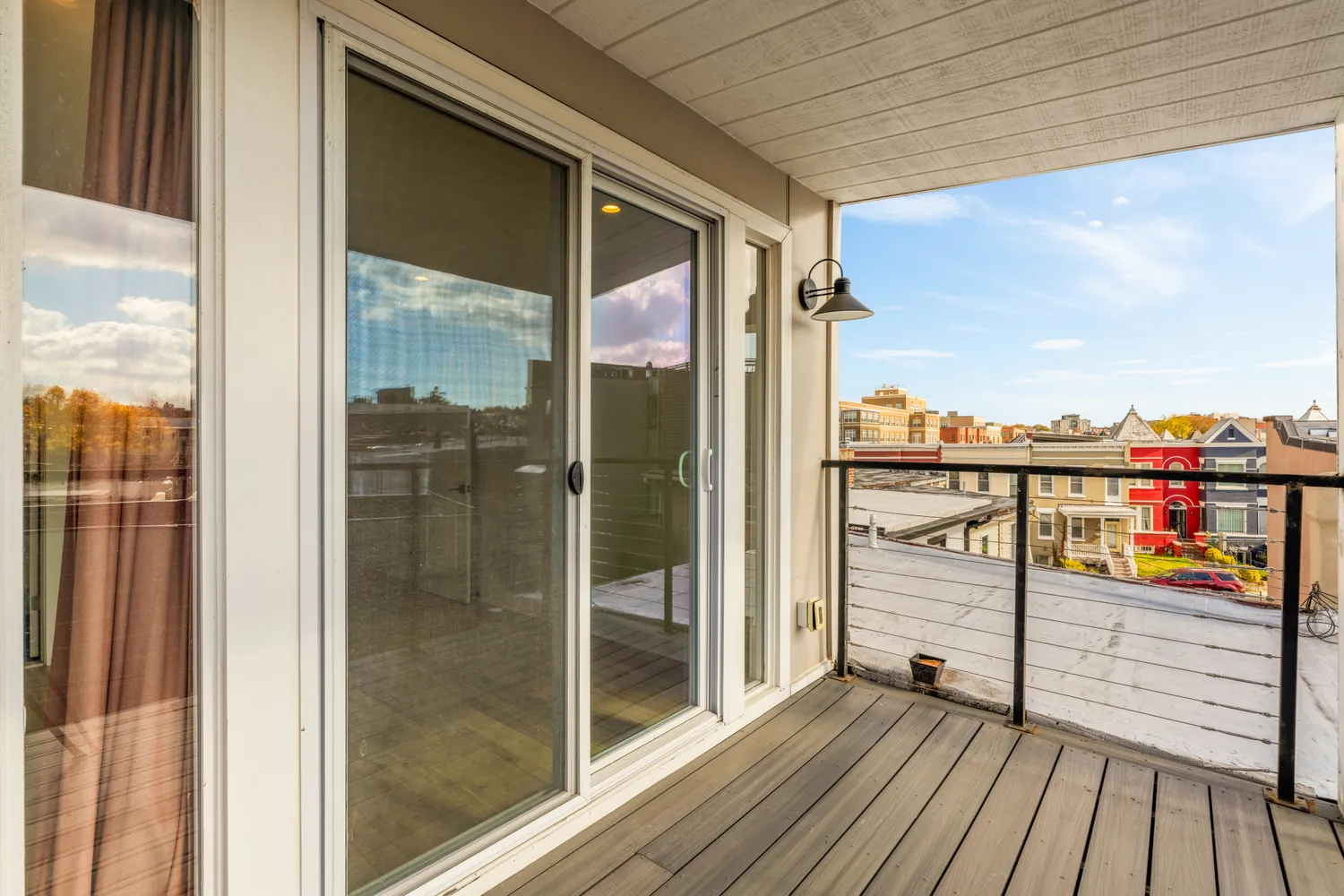 a view of a balcony with a ocean view