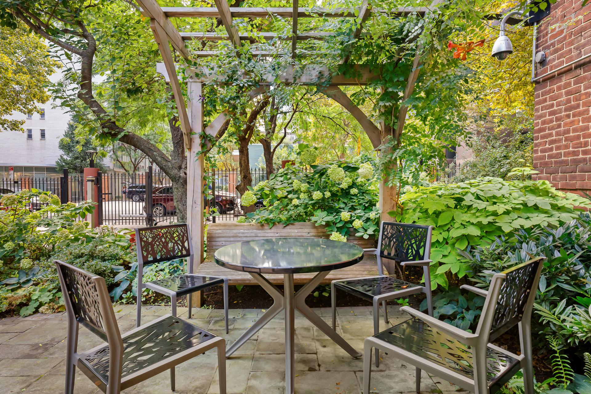 191 Willoughby Street, Unit 6N Brooklyn, NY 11201 - Photo 16 of 17 a view of a chairs and table in backyard