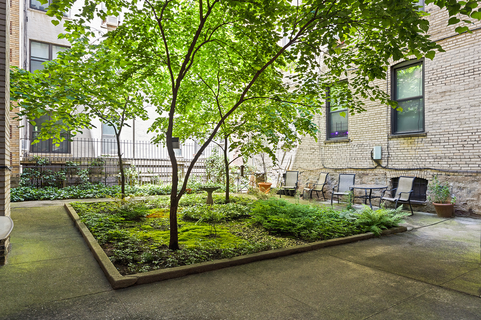 125 Eastern Parkway, Unit 3A Brooklyn, NY 11238 - Photo 7 of 15 front view of a house with a yard