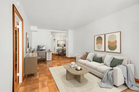 a living room with furniture and a couch