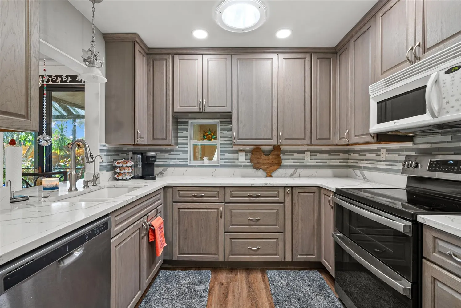 a very nice looking room with many glass windows