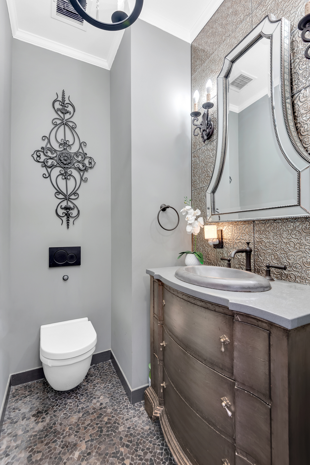 7921 Narrows Avenue Brooklyn, NY 11209 - Photo 16 of 42 a bathroom with a toilet a sink and mirror