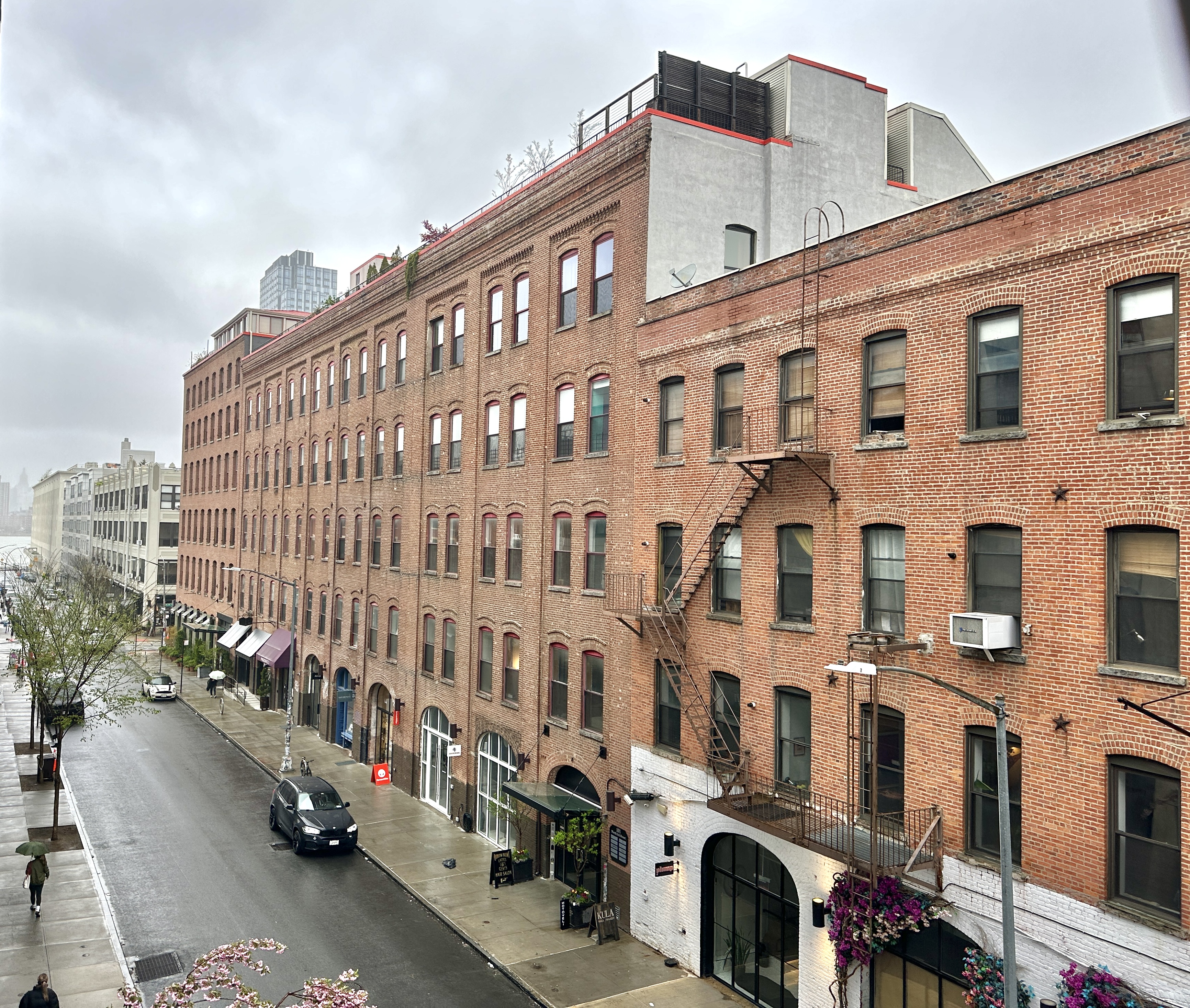 100 North 3rd Street, Unit 3E Brooklyn, NY 11249 - Photo 12 of 15 a large building with a parking space