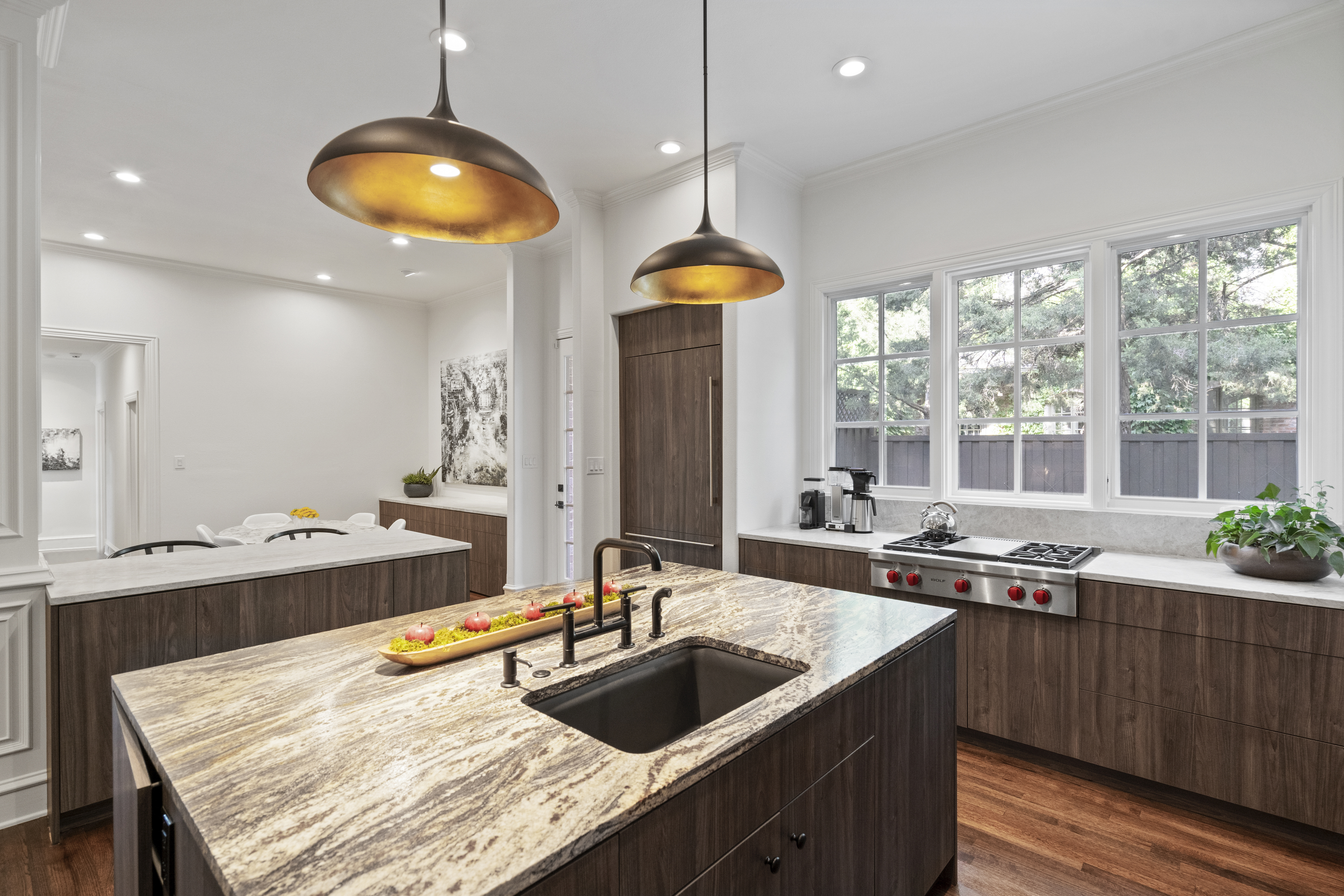 6607 Meadow Road Dallas, TX 75230 - Photo 9 of 32 a kitchen with a sink and a large window