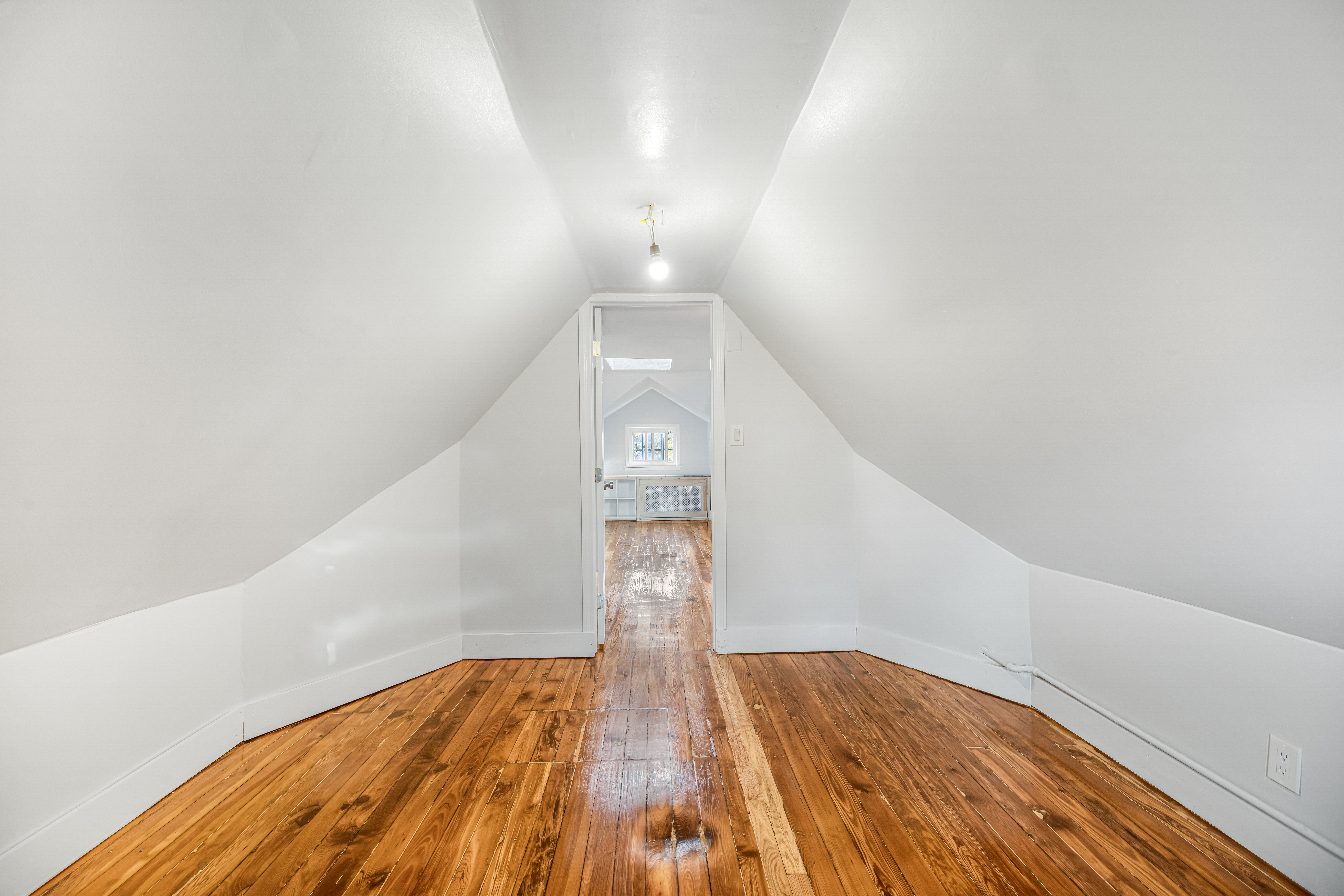 180 East 5th Street, Unit 2 Brooklyn, NY 11218 - Photo 10 of 14 a view of empty room with wooden floor