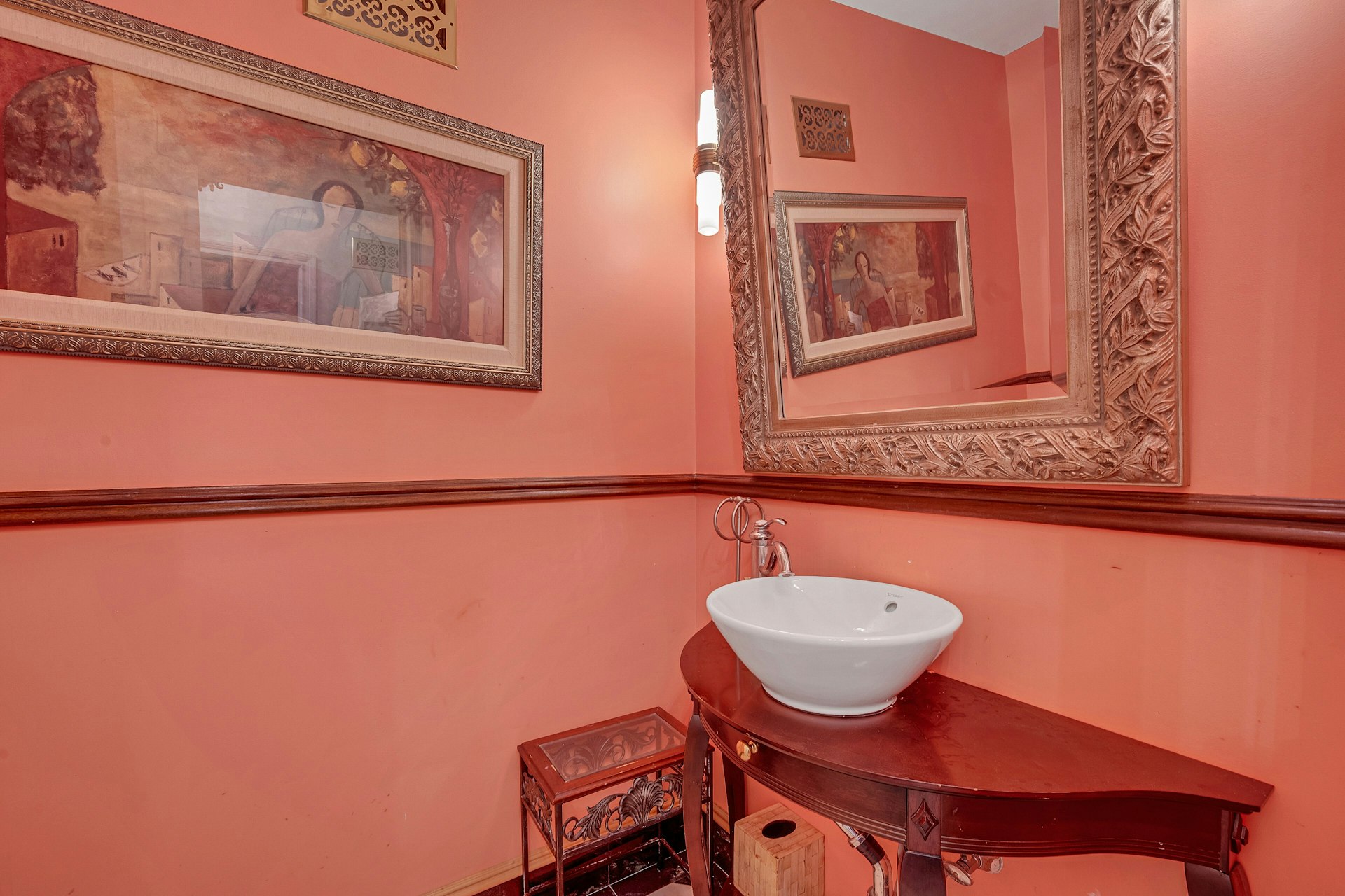 5440 Independence Avenue Bronx, NY 10471 - Photo 19 of 36 a bathroom with a sink mirror and a table