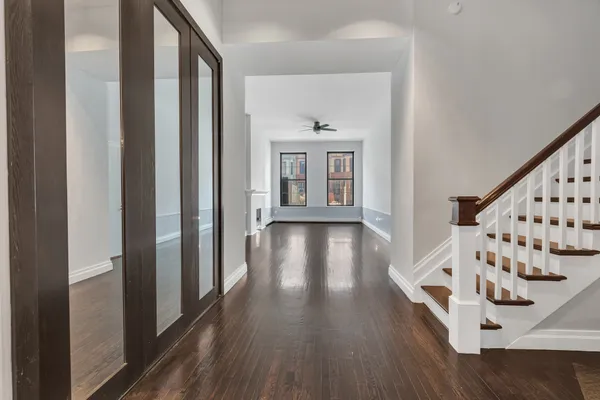 a view of entryway with wooden floor