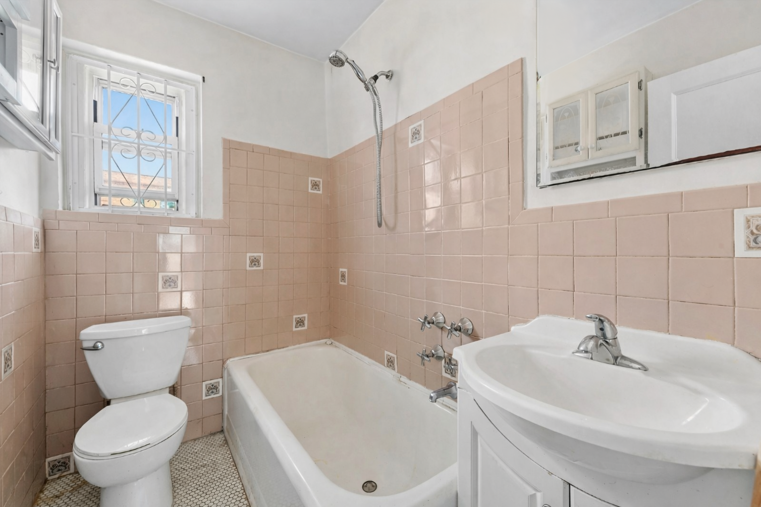 5444 Arlington Avenue, Unit G51 Bronx, NY 10471 - Photo 14 of 16 a bathroom with a sink toilet and shower