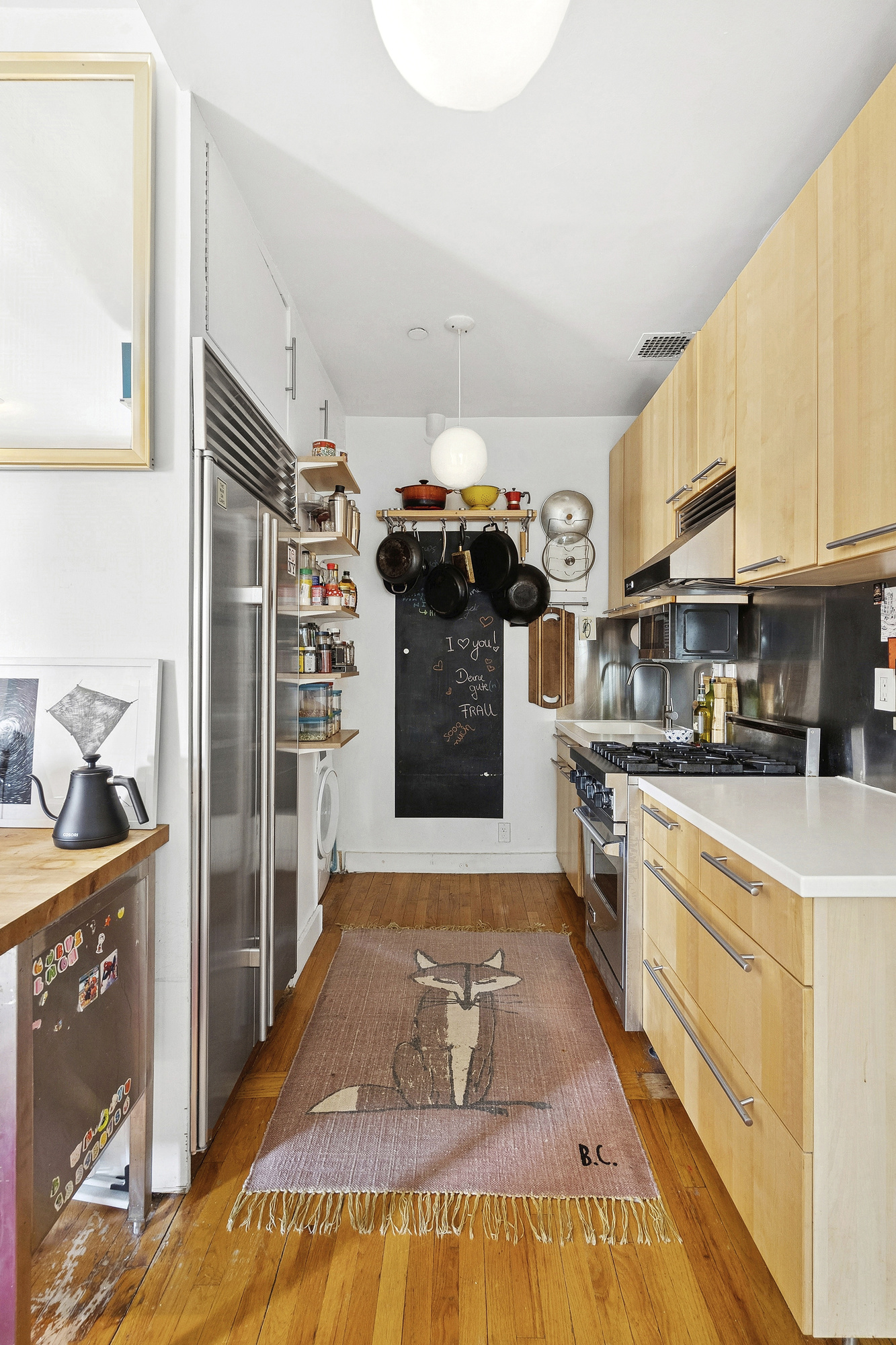 184 Clinton Avenue, Unit 4A Brooklyn, NY 11205 - Photo 4 of 9 a kitchen with stainless steel appliances granite countertop a stove and a refrigerator