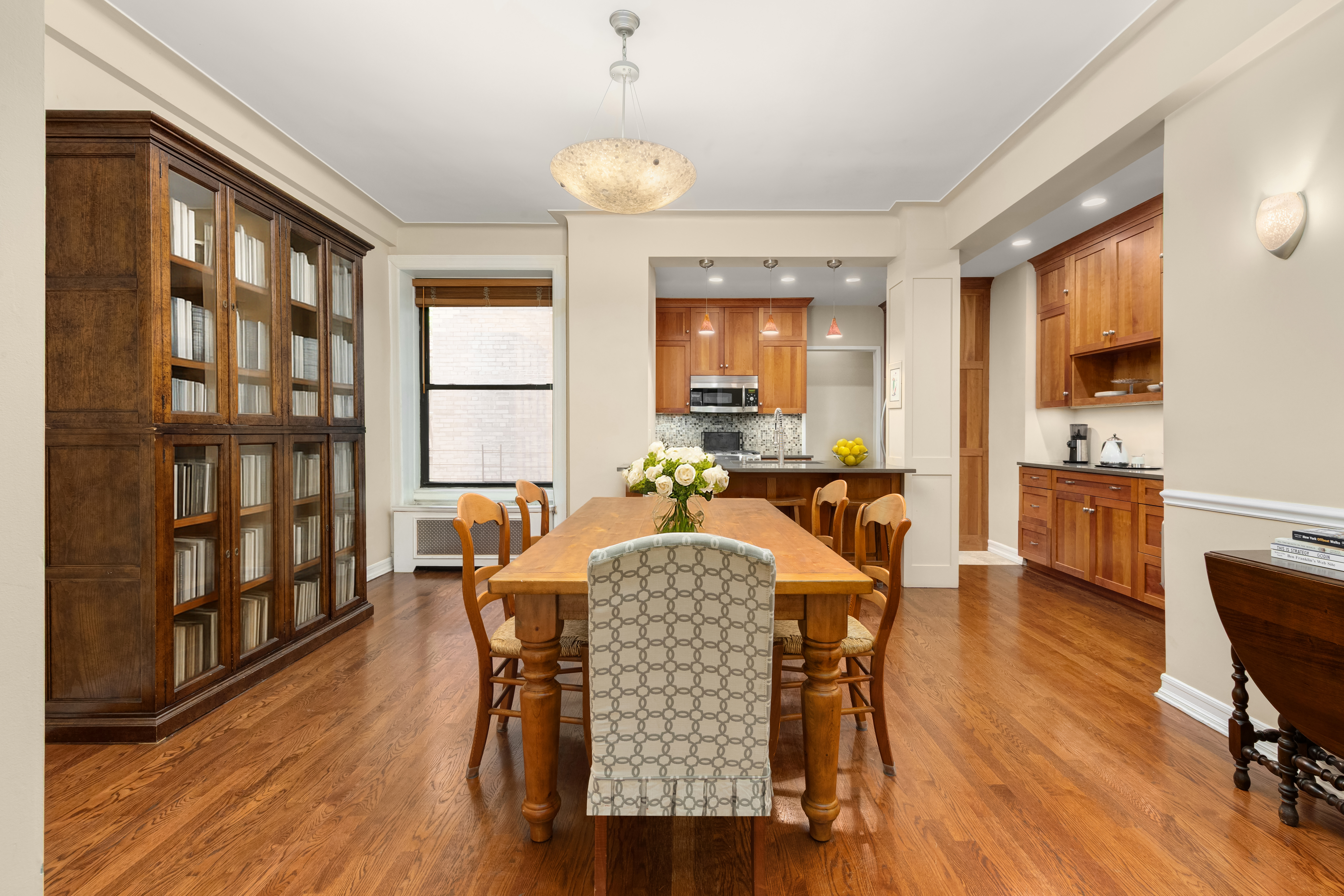 176 West 87th Street, Unit 3A Manhattan, NY 10024 - Photo 2 of 8 a living room with furniture and a wooden floor