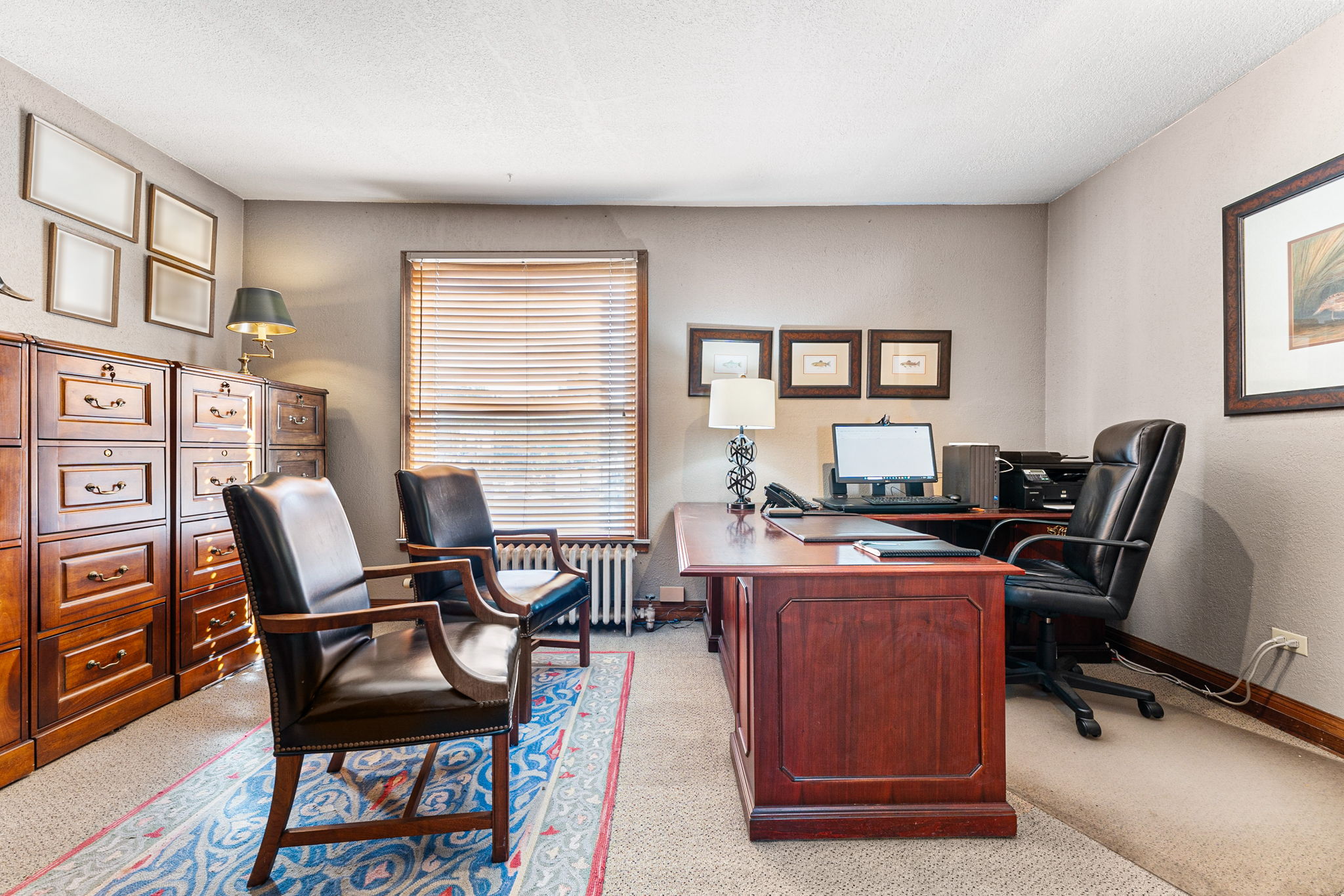 681 Grant Street Denver, CO 80203 - Photo 12 of 15 a workspace with furniture and a window