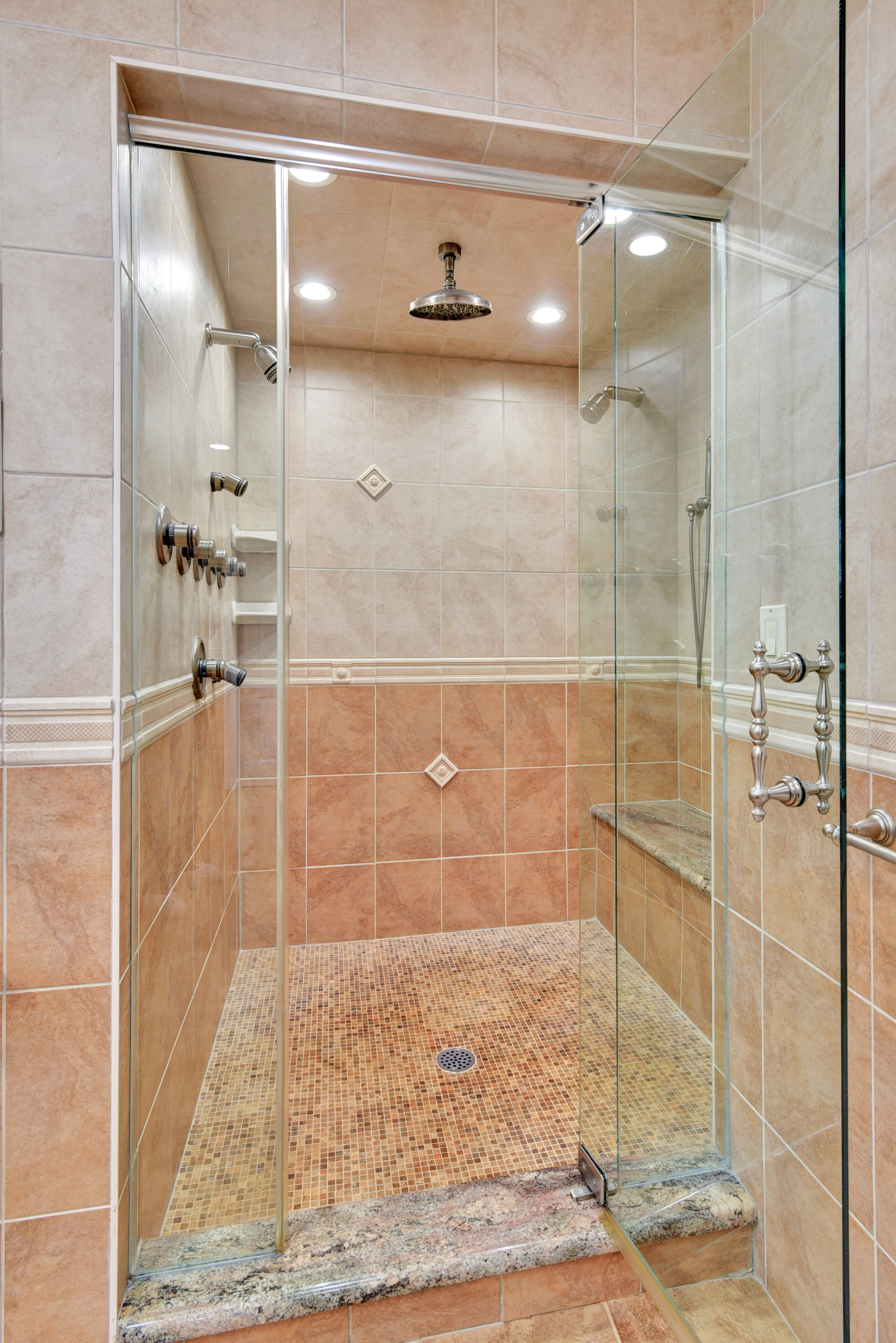 215 Lawrence Avenue Staten Island, NY 10310 - Photo 19 of 45 a bathroom with a shower and a sink