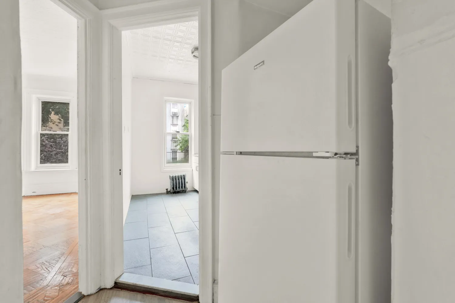 a view of a room that has a window in it