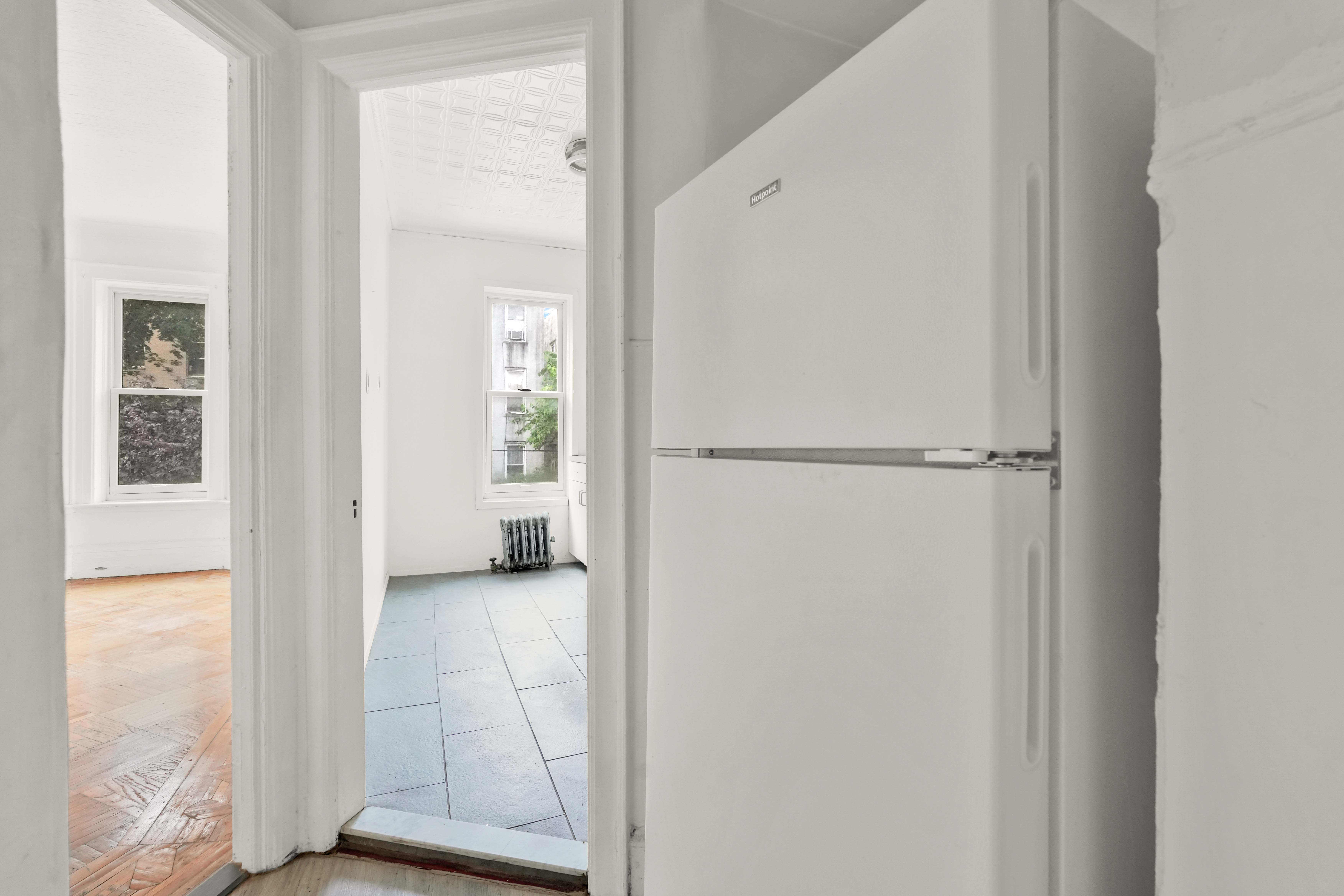 278 Lefferts Avenue Brooklyn, NY 11225 - Photo 15 of 56 a view of a room that has a window in it