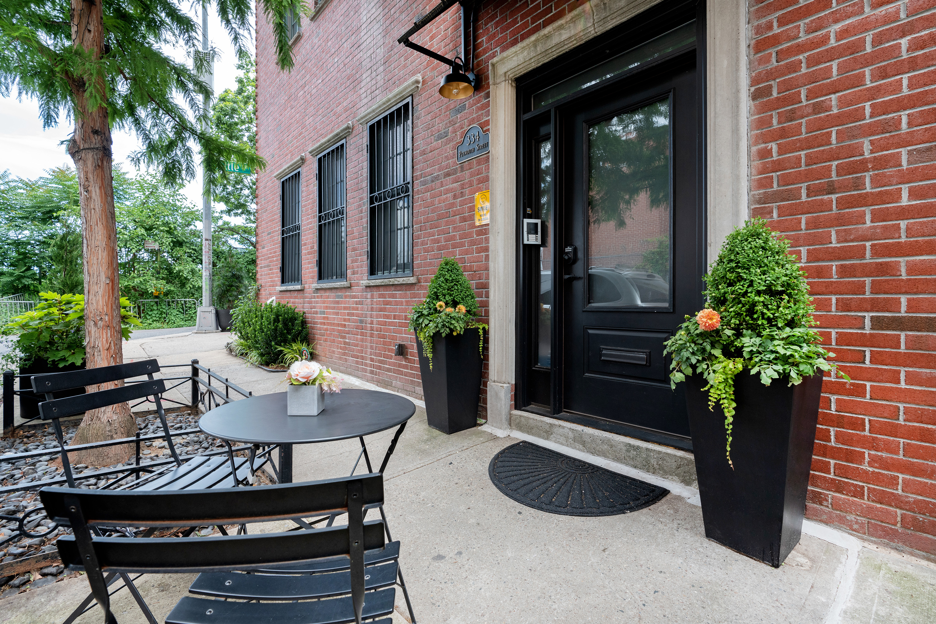 334 Plymouth Street Brooklyn, NY 11201 - Photo 29 of 32 a view of a house with backyard and sitting area