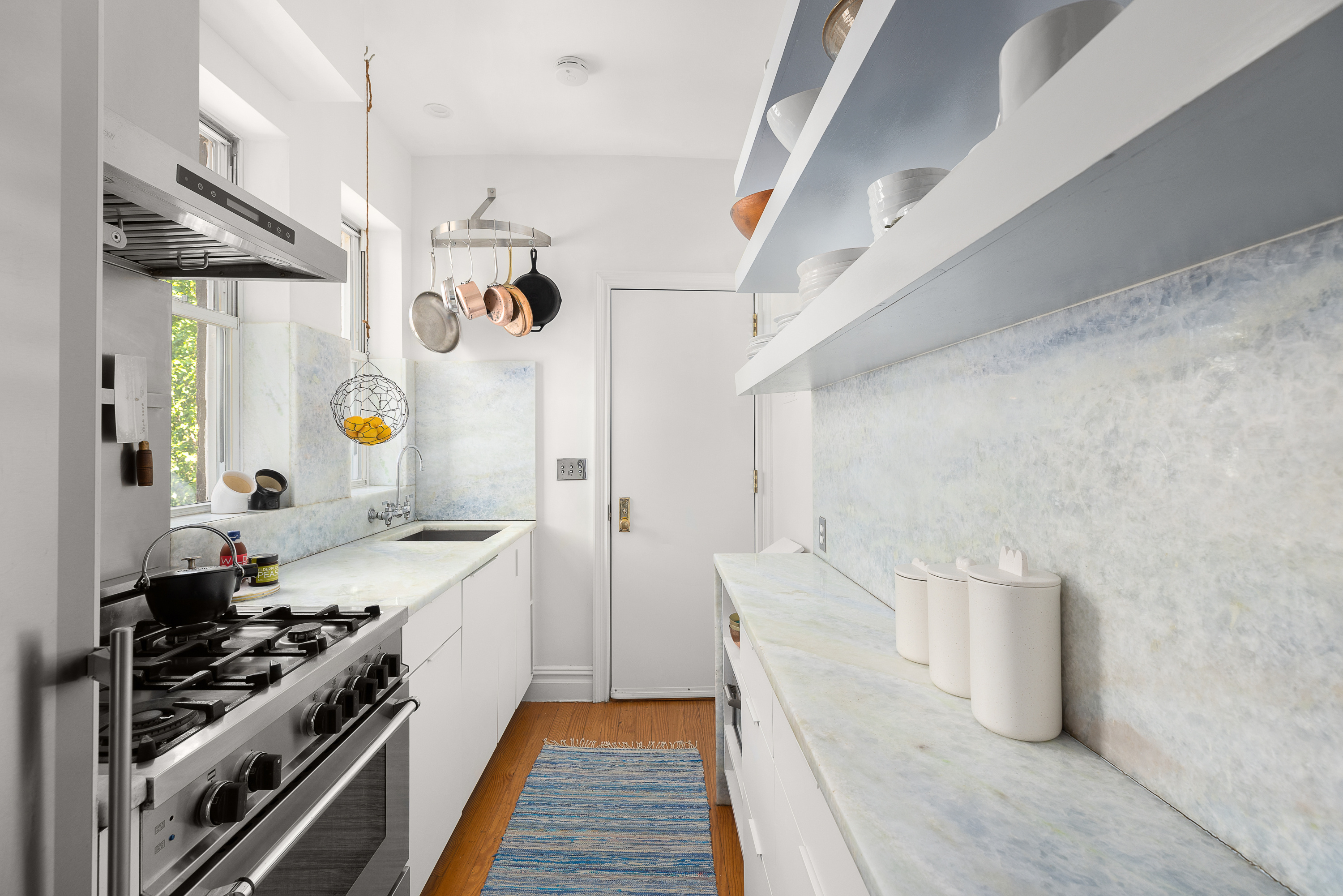 214 Carlton Avenue, Unit 2 Brooklyn, NY 11205 - Photo 6 of 16 a kitchen with a sink and a stove top oven