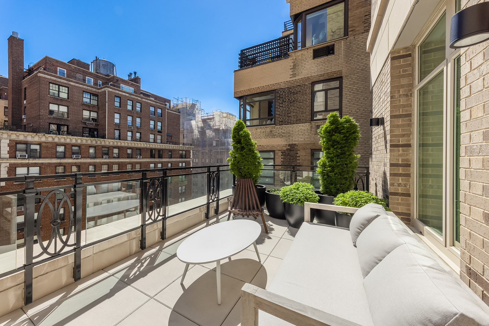 1228 Madison Avenue, Unit 10 Manhattan, NY 10128 - Photo 5 of 21 a view of a building from a balcony