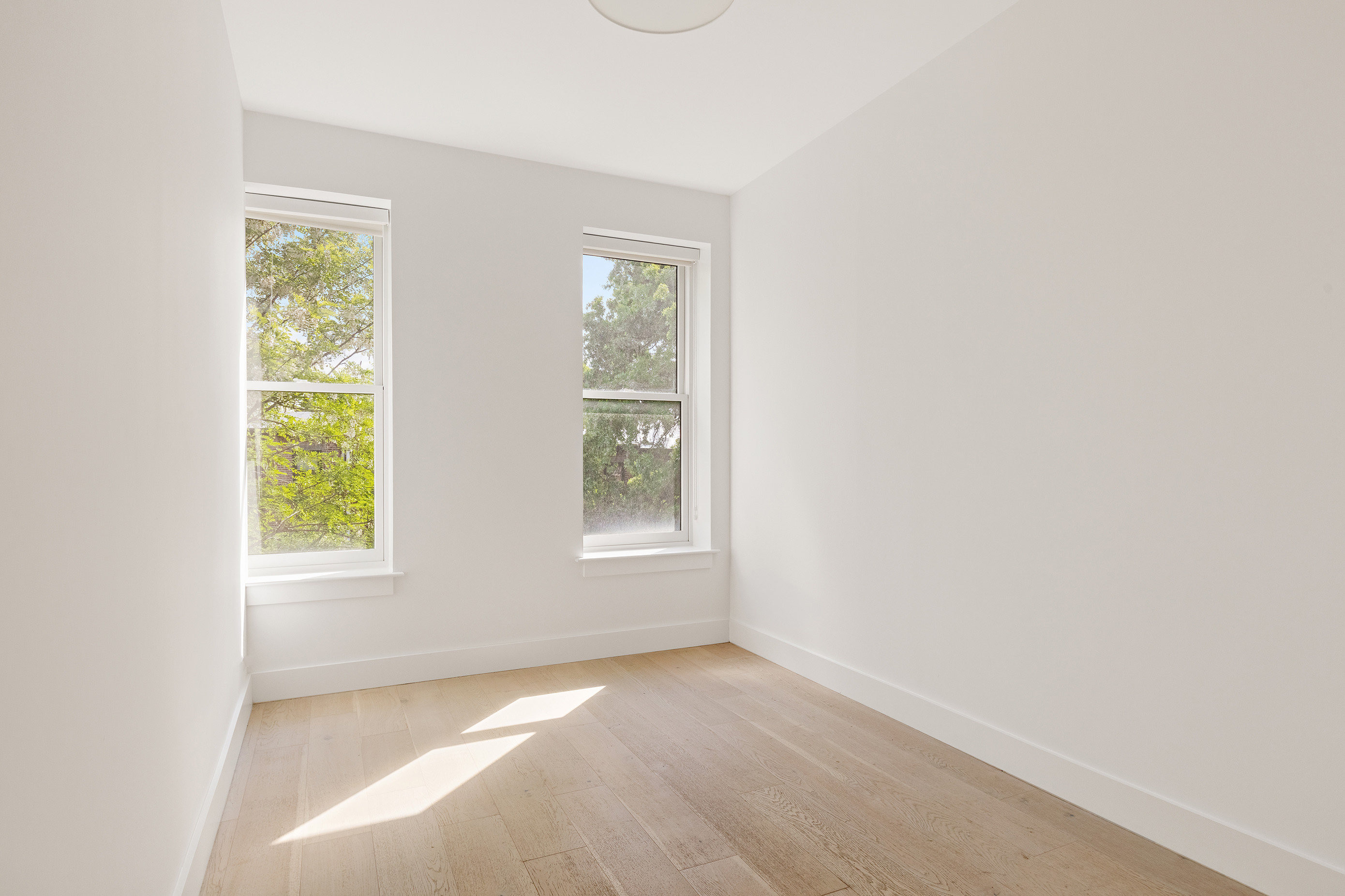 494 7th Street, Unit 3 Brooklyn, NY 11215 - Photo 5 of 9 a view of an empty room with a window