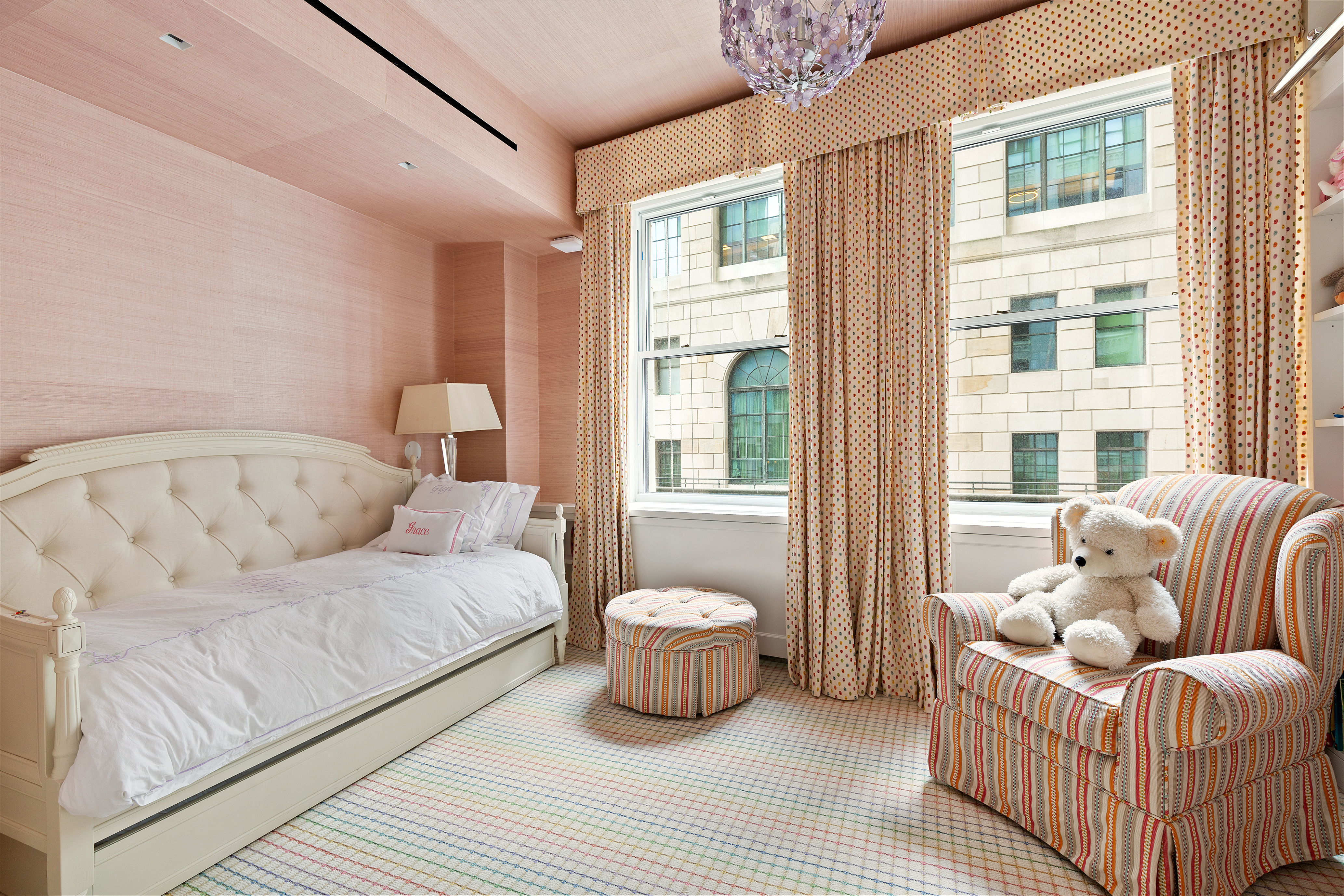 55 Liberty Street, Unit 15 Manhattan, NY 10005 - Photo 16 of 25 a bedroom with furniture and a large window