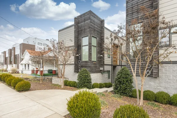 swimming pool view with a seating space