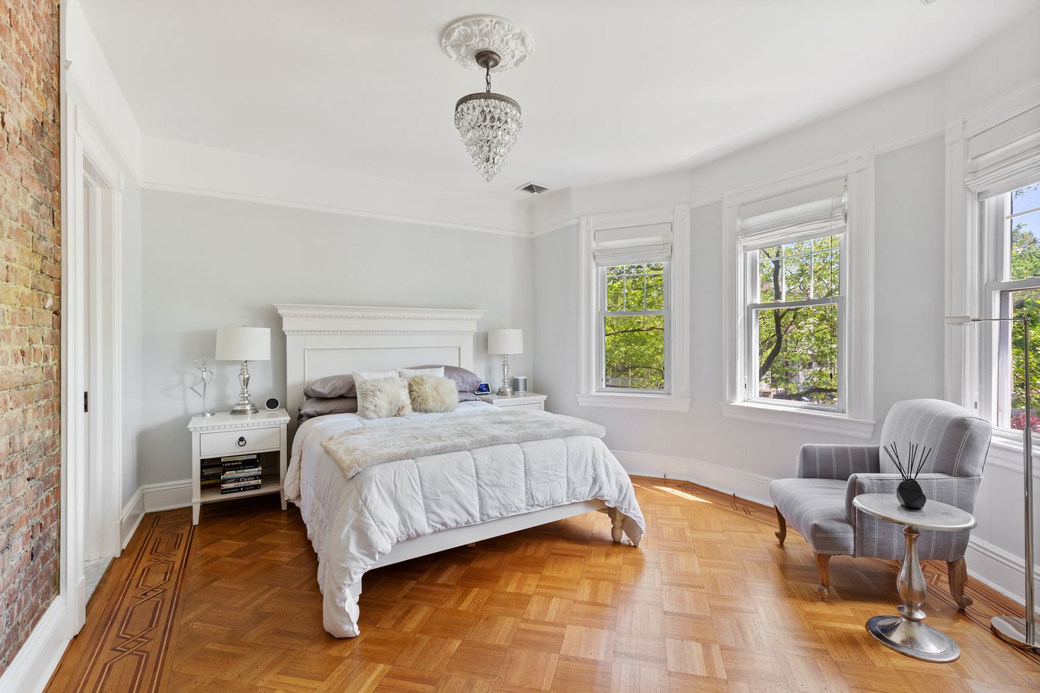 685 East 22nd Street Brooklyn, NY 11210 - Photo 15 of 43 a bedroom with a bed and window