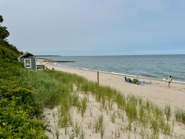 a view of a swimming pool and an outdoor seating