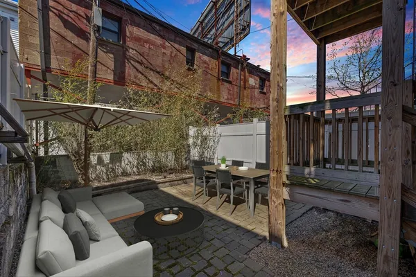 a building outdoor space with patio furniture