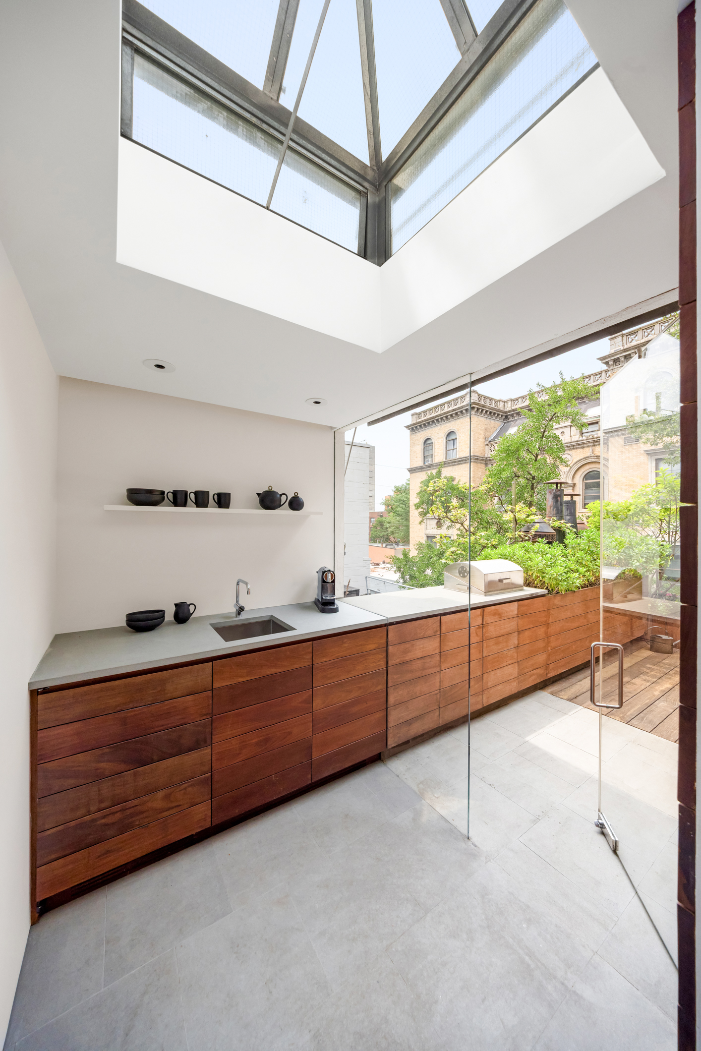 130 Charles Street Manhattan, NY 10014 - Photo 12 of 15 a room with a large window