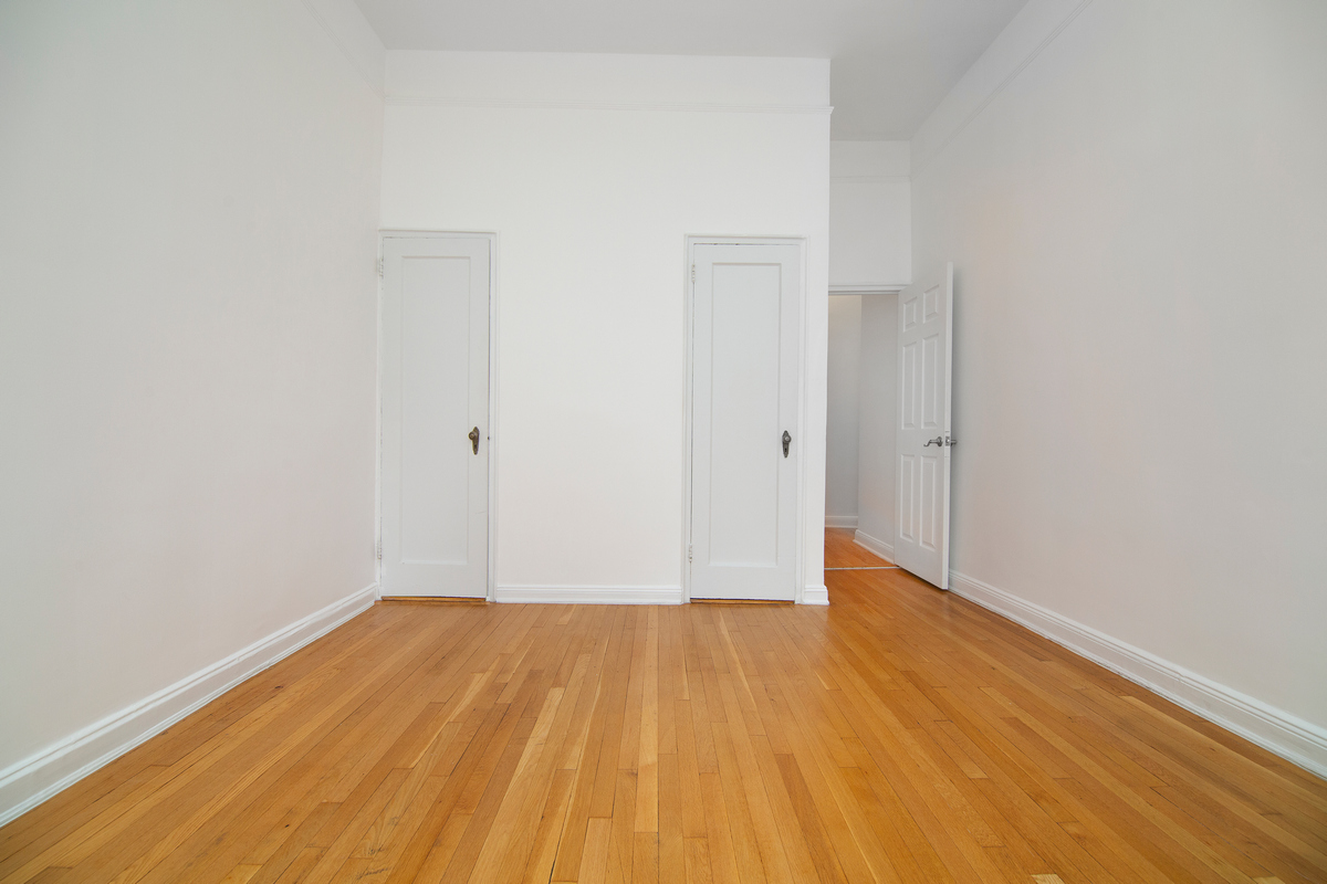104 East 37th Street, Unit 5C Manhattan, NY 10016 - Photo 4 of 9 a view of a room with wooden floor