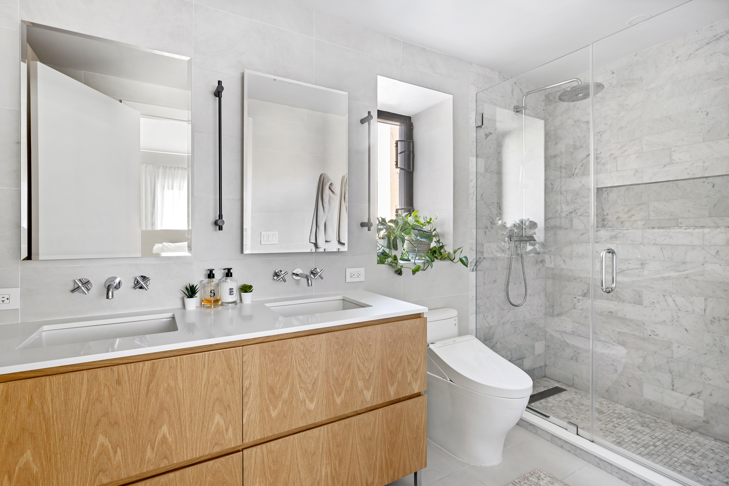 47 Dean Street, Unit 3B Brooklyn, NY 11201 - Photo 7 of 11 a bathroom with a sink toilet and shower