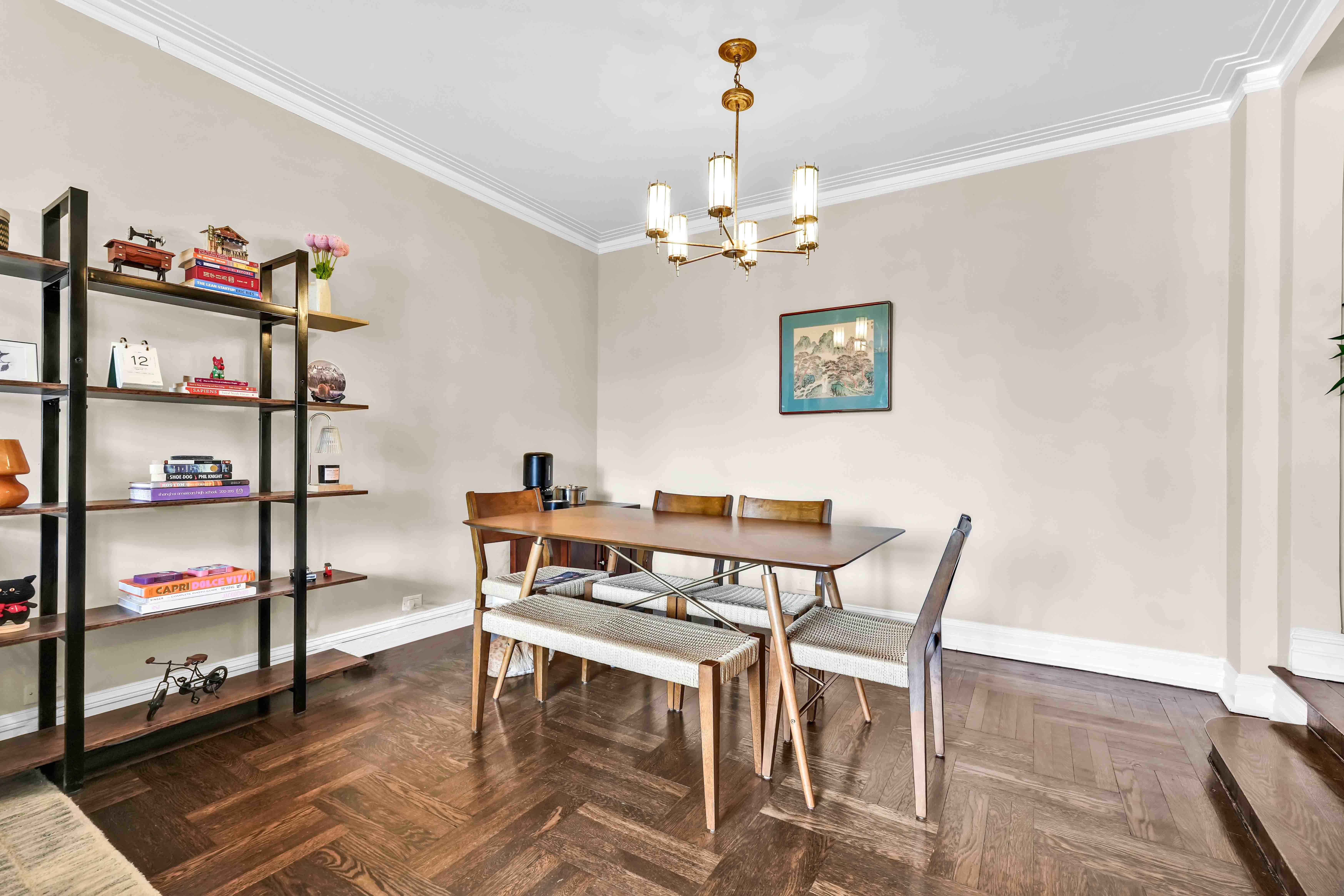 255 West 23rd Street, Unit 5GW Manhattan, NY 10011 - Photo 8 of 35 a view of a dining room with furniture and a window