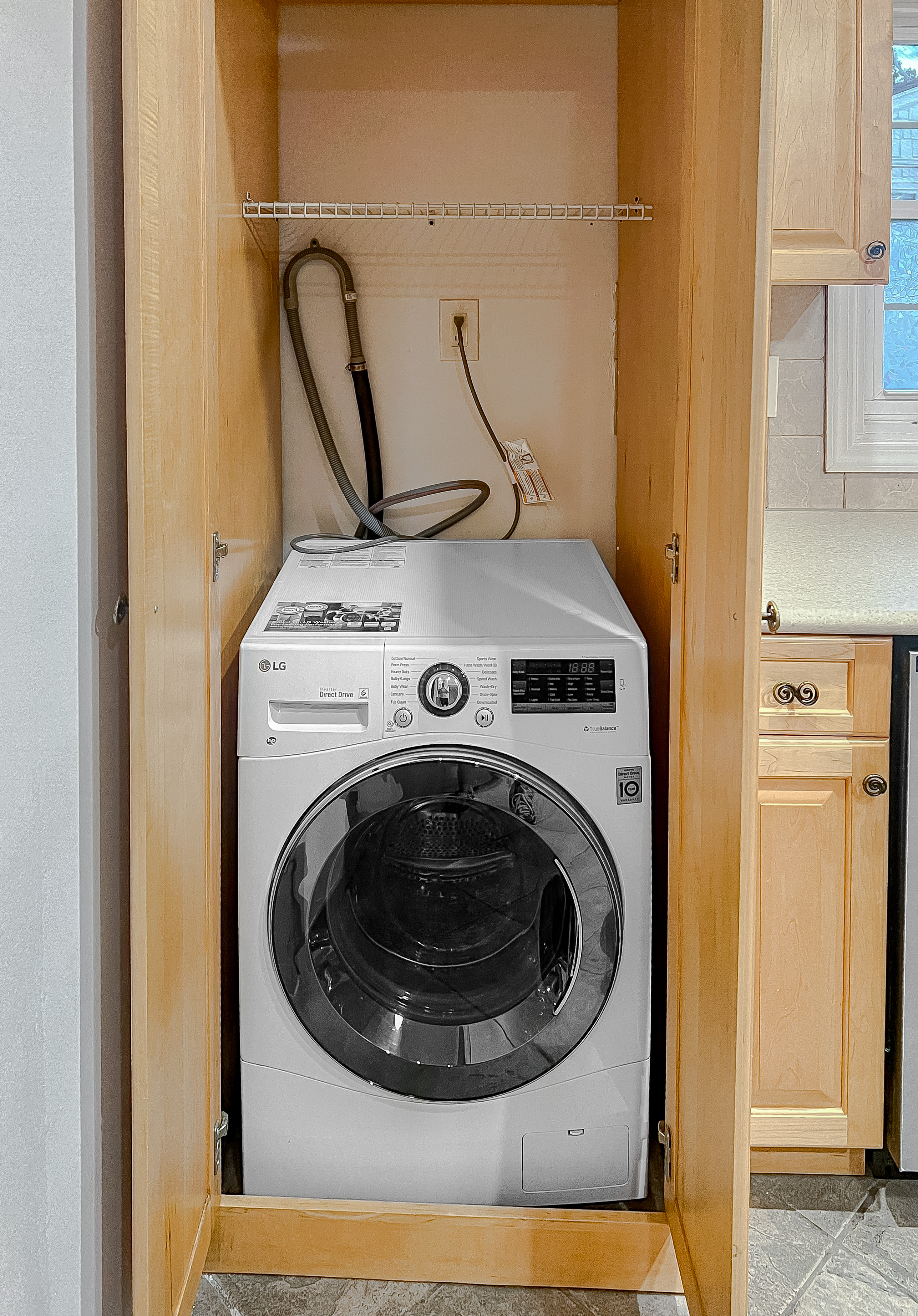 15-80 209th Street, Unit 2 Queens, NY 11360 - Photo 2 of 11 a utility room with dryer and washer