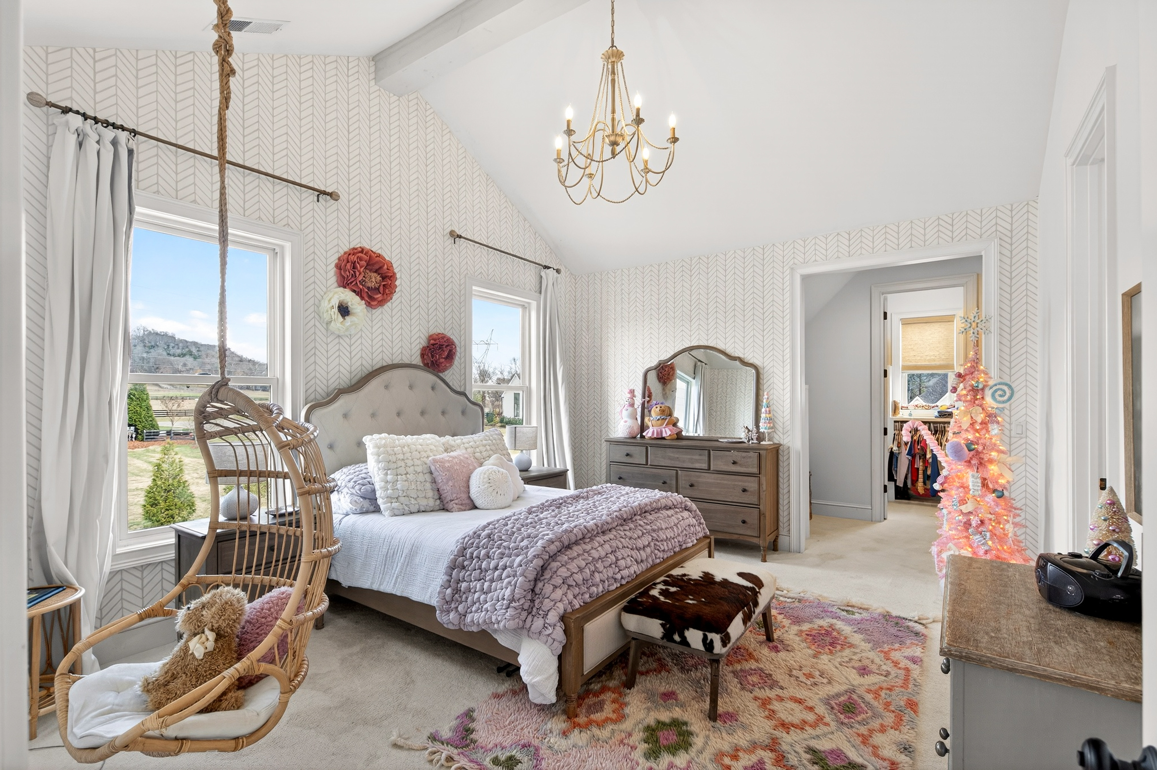 1703 Swansons Rdg Drive Franklin, TN 37064 - Photo 49 of 67 a bedroom with a bed and a chandelier