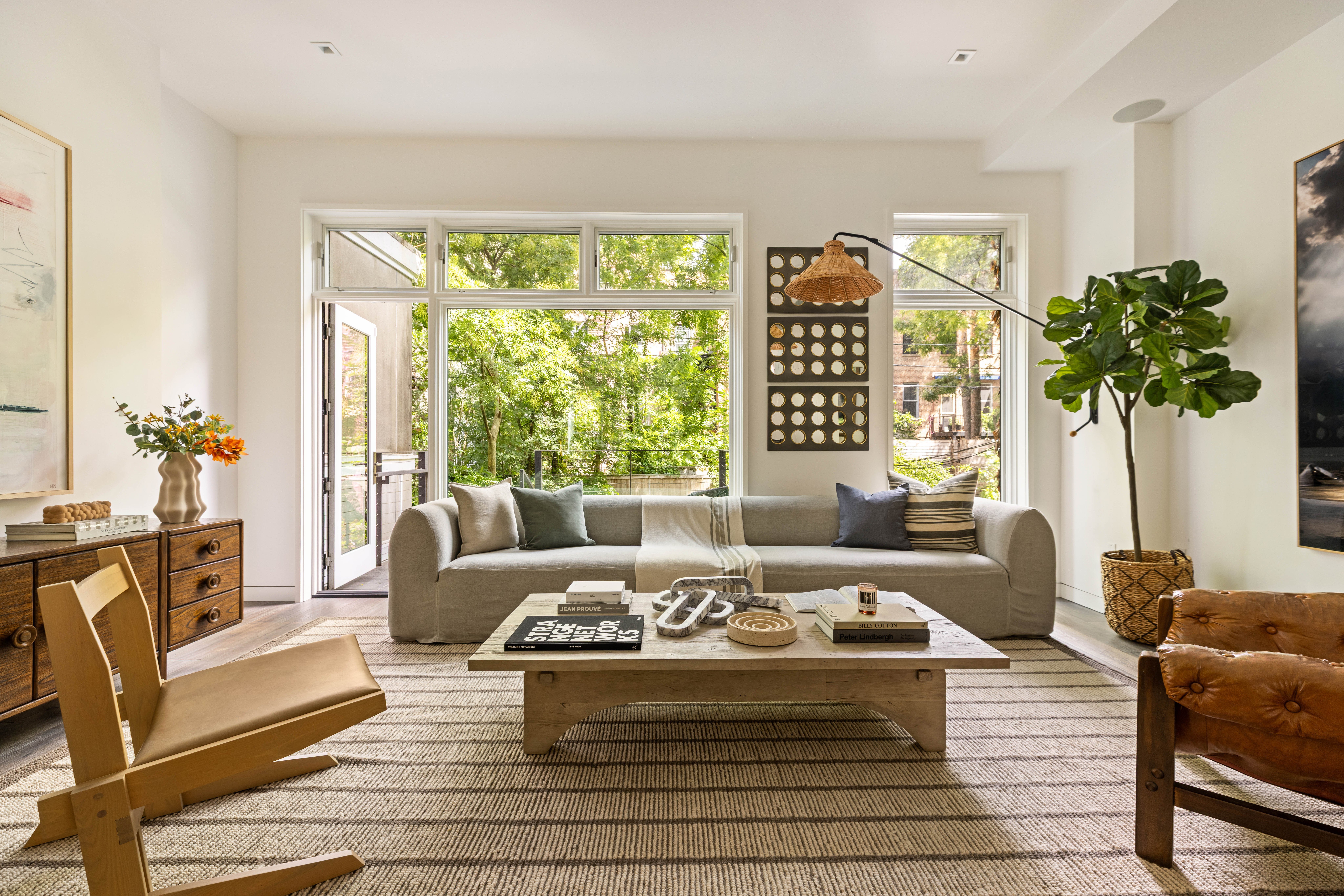 229 Dean Street Brooklyn, NY 11217 - Photo 2 of 23 a living room with furniture and a large window