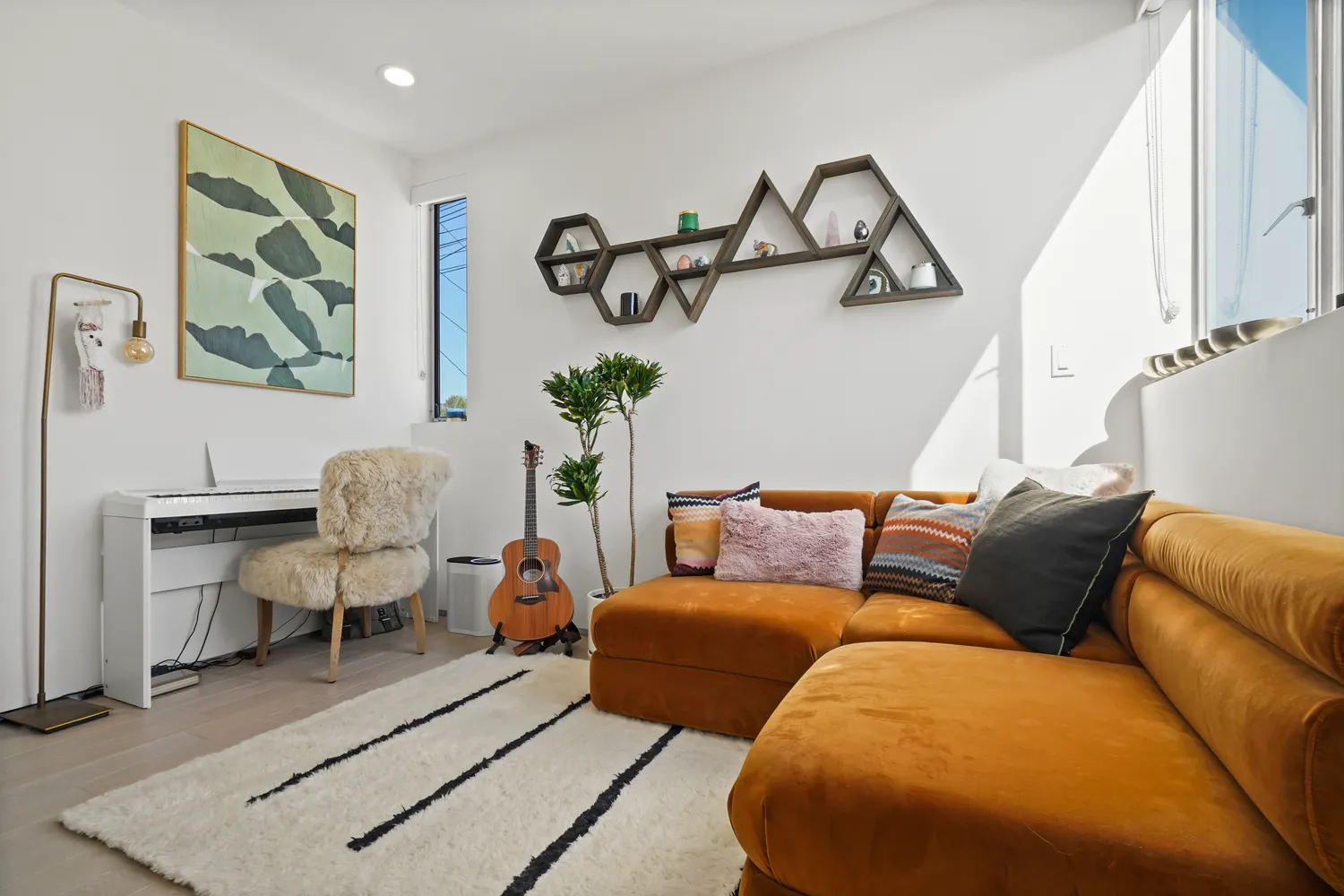 a living room with furniture and rug
