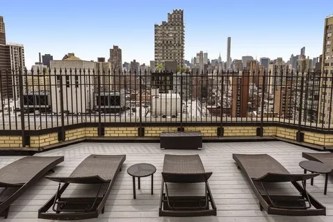 a view of a terrace with sitting area