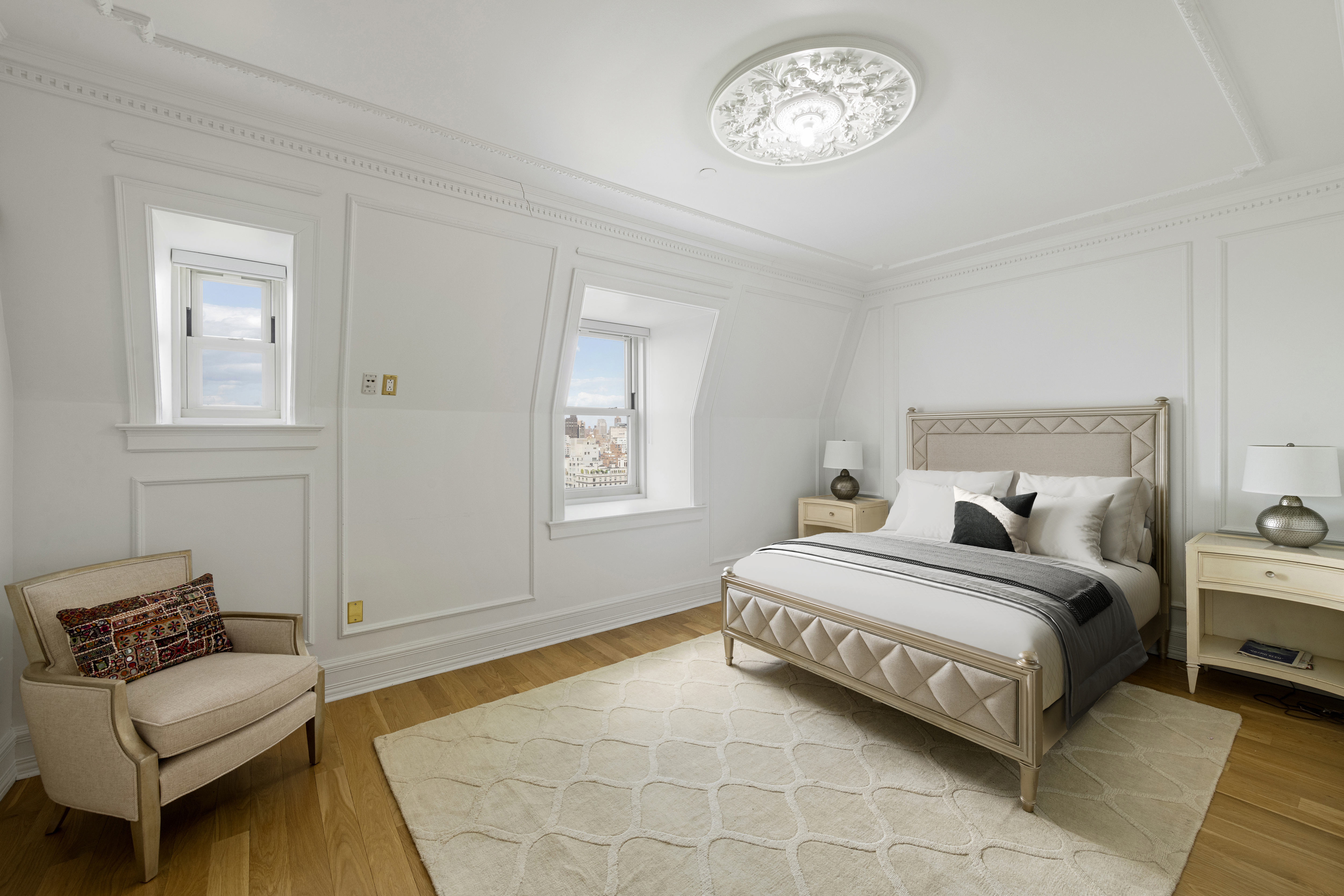 1 Central Park South, Unit 1801 Manhattan, NY 10019 - Photo 15 of 25 a bedroom with a bed and a couch