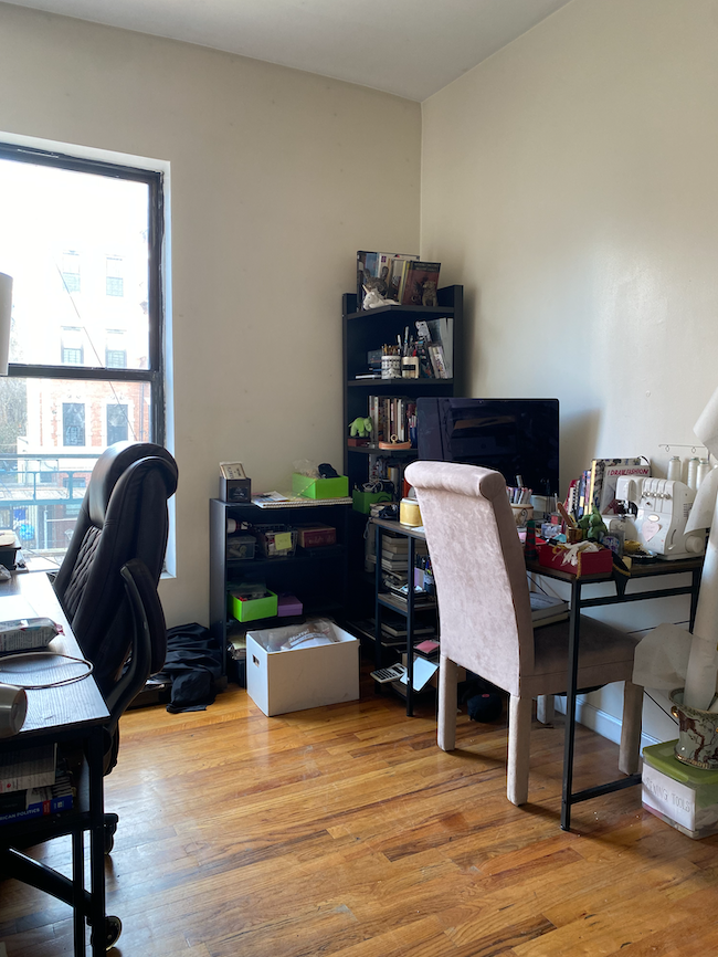 470 West 166th Street, Unit 21 Manhattan, NY 10032 - Photo 6 of 8 a view of a workspace with furniture and a lounge chair