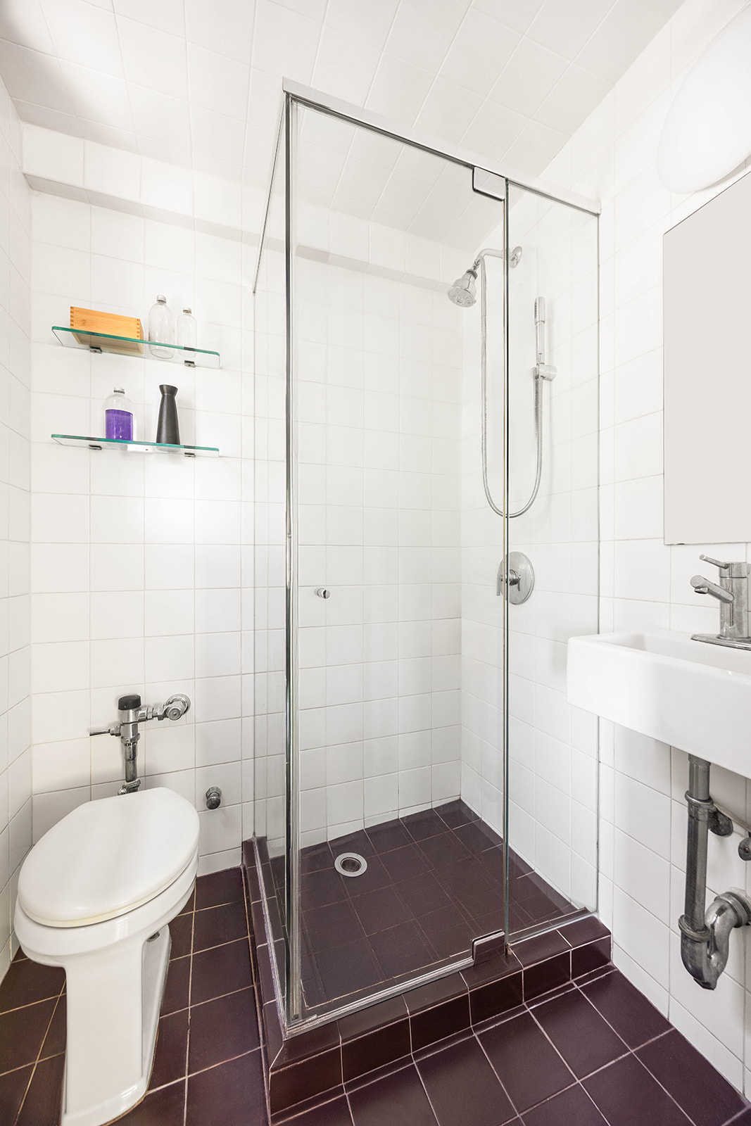 303 Beverley Road, Unit 3H Brooklyn, NY 11218 - Photo 9 of 11 a bathroom with a toilet and a shower