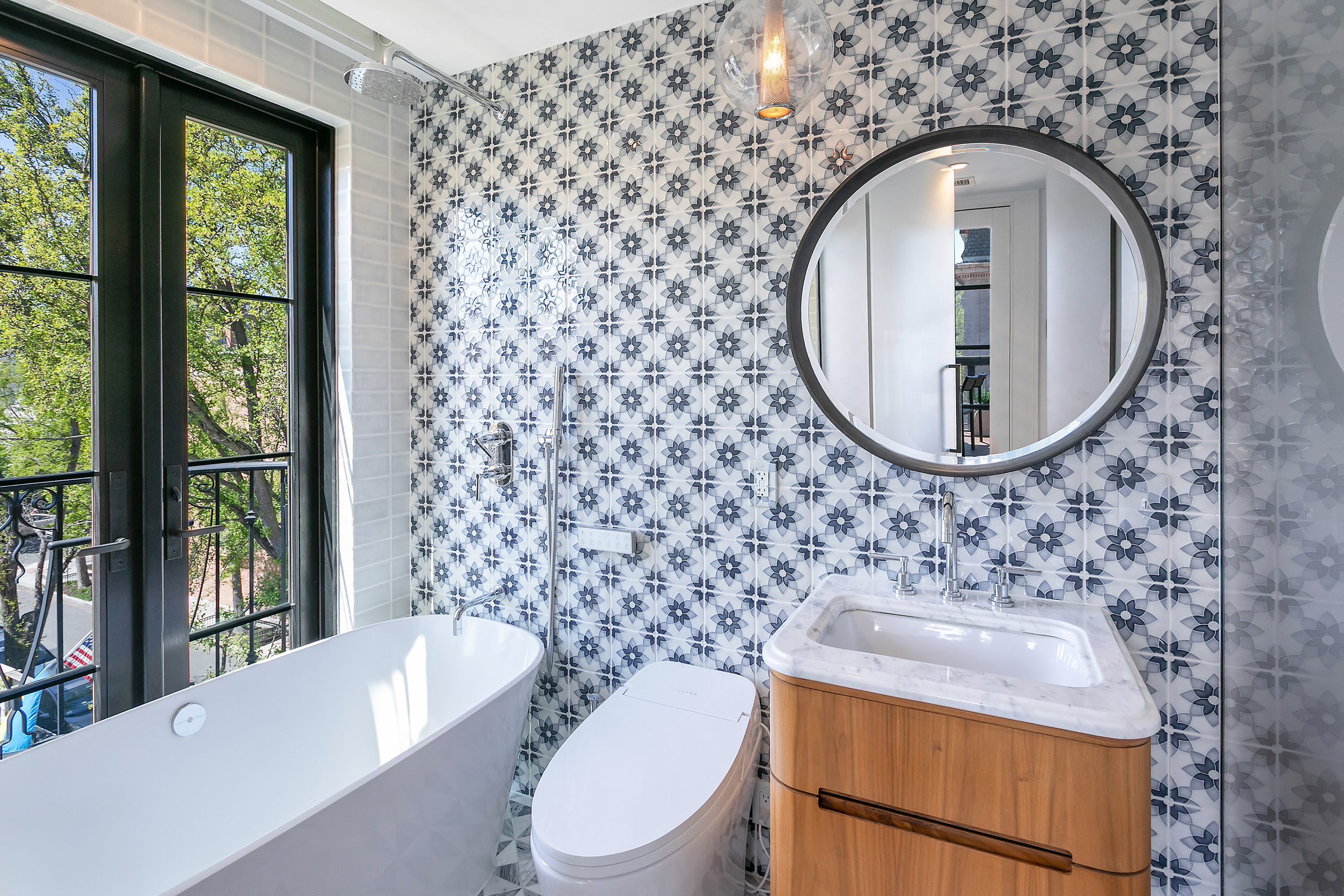 1832 Corcoran Street Northwest Washington, DC 20009 - Photo 14 of 29 a bathroom with a sink a toilet and a mirror