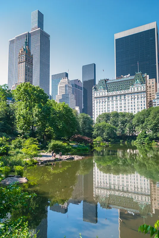 1 Central Park South, Unit 1010 Manhattan, NY 10019 - Photo 8 of 11 a view of a lake with a building in the background