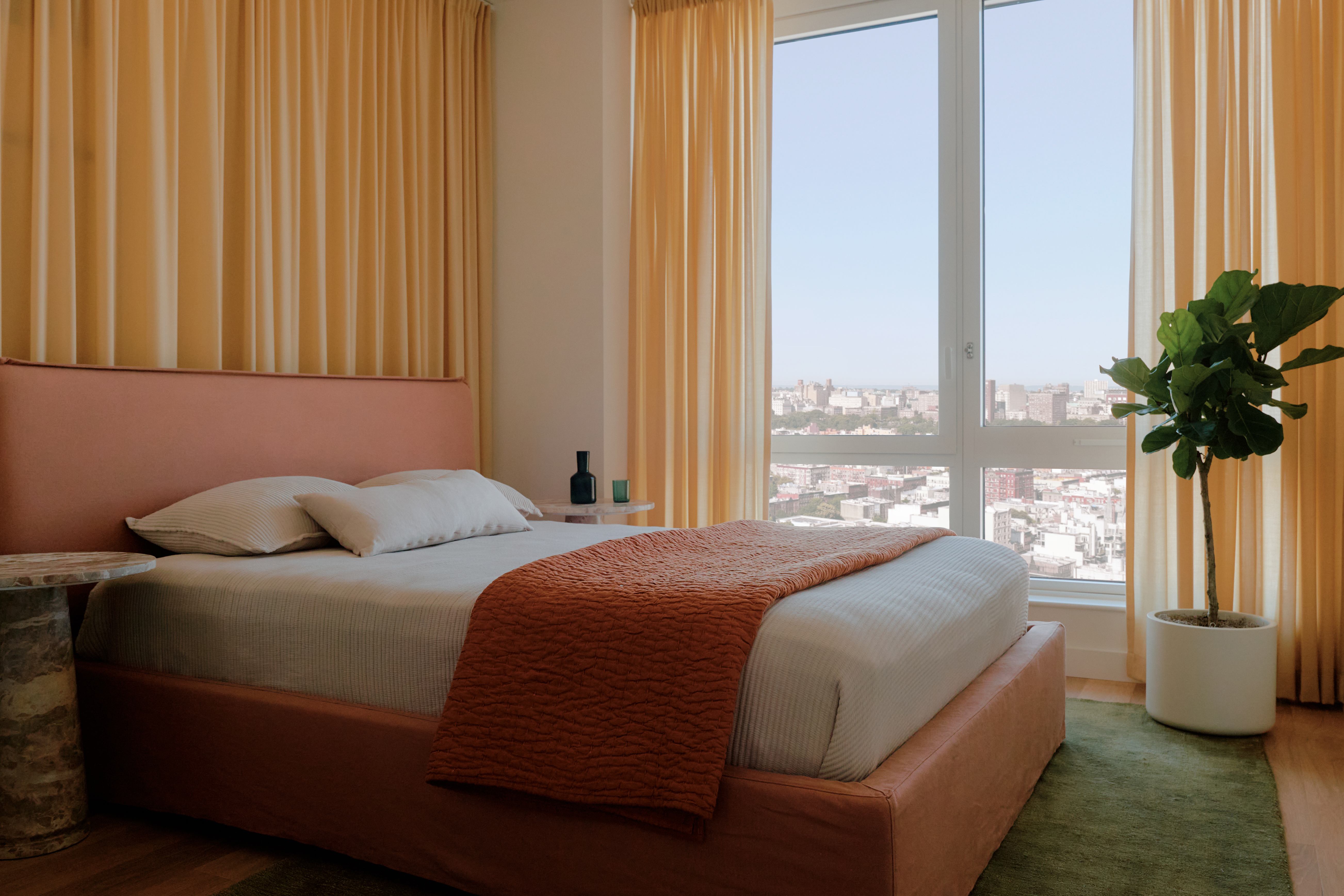 2035 5th Avenue, Unit 21K Manhattan, NY 10035 - Photo 3 of 14 a bedroom with a bed and a window