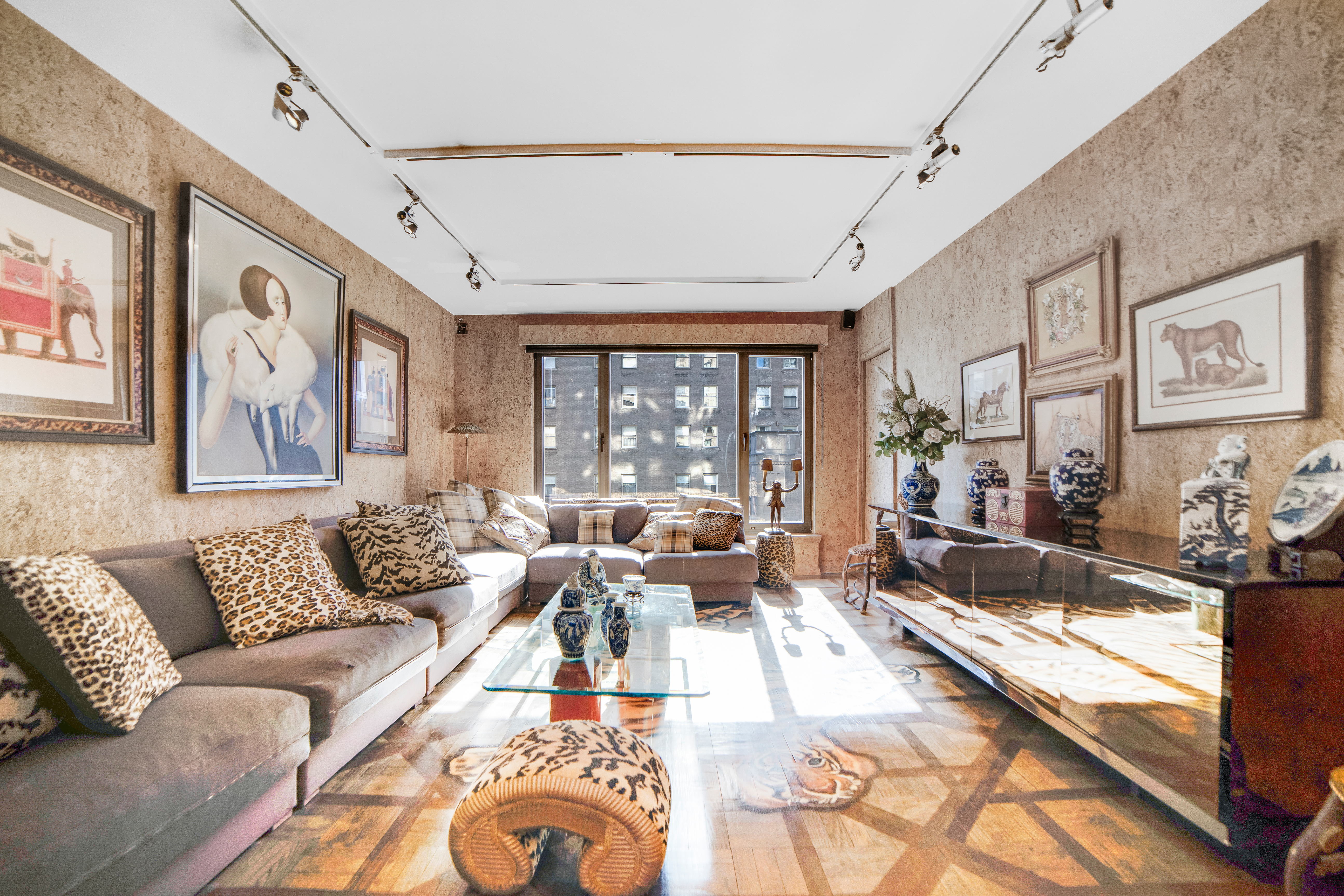 200 Central Park South, Unit 24A Manhattan, NY 10019 - Photo 12 of 23 a living room with furniture large window and couch