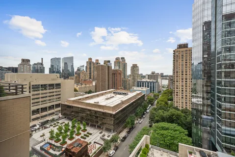 a view of a city with tall buildings