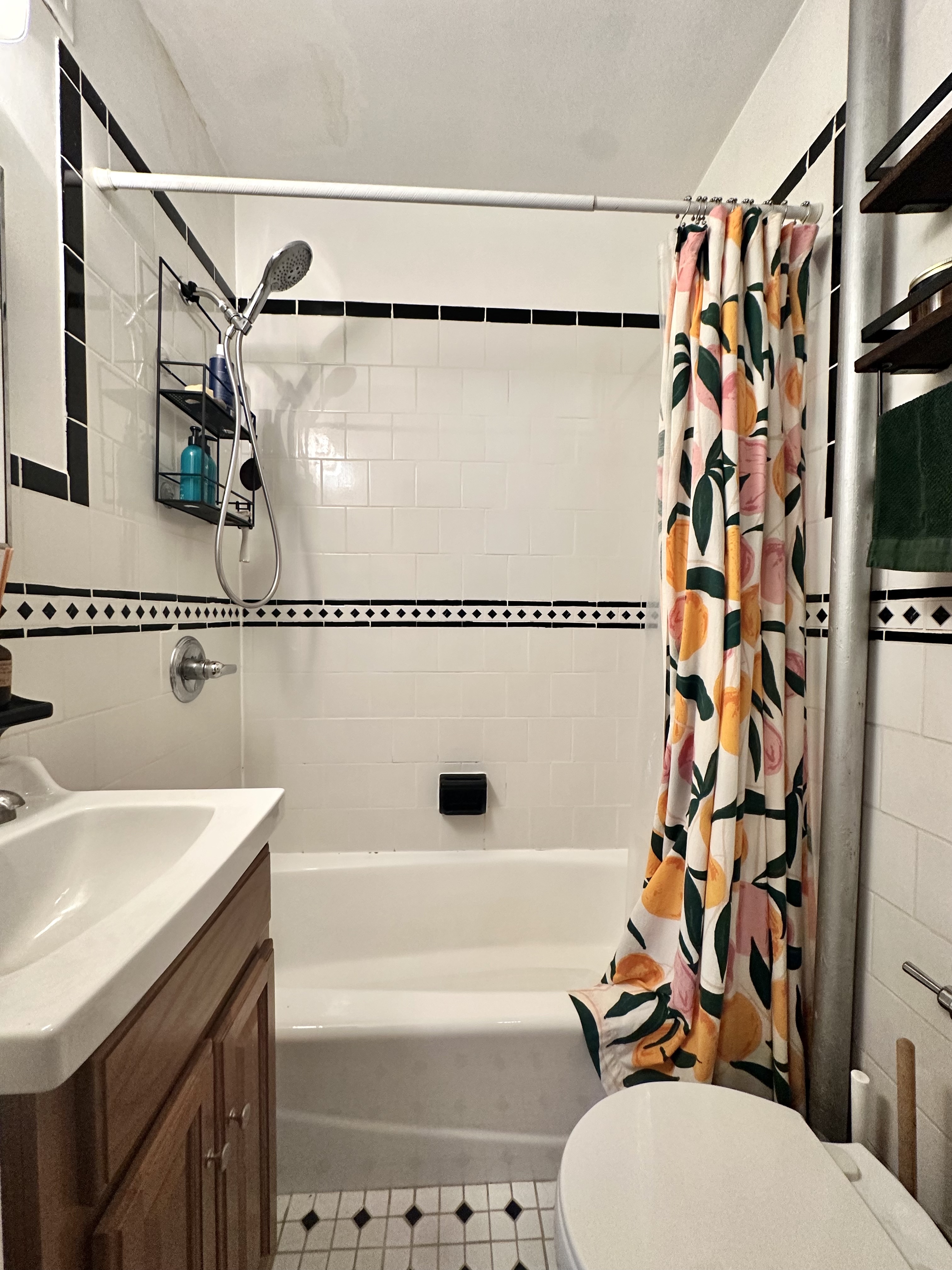 85 Bergen Street, Unit B1 Brooklyn, NY 11201 - Photo 8 of 9 a bathroom with a sink a toilet and shower curtain